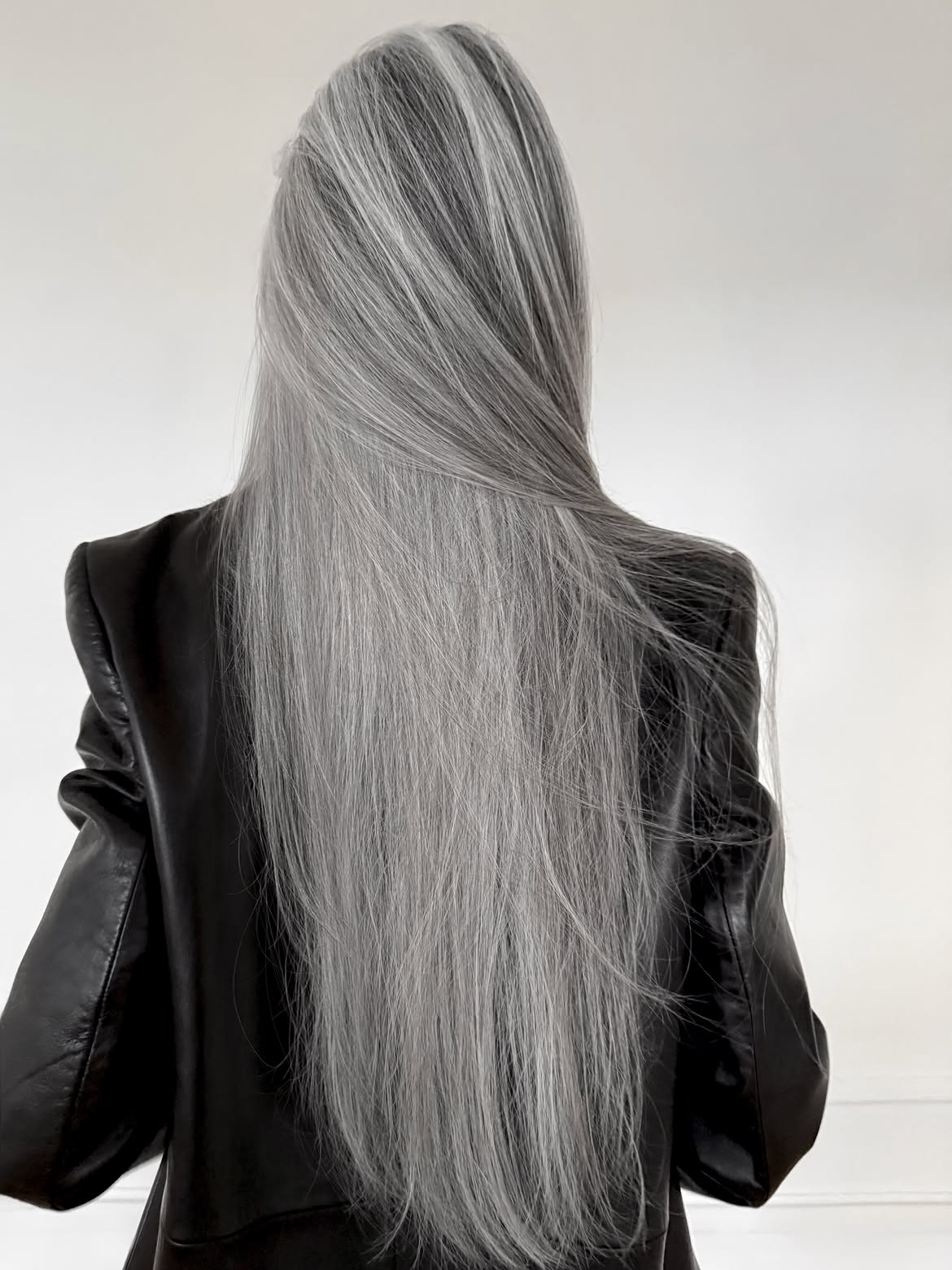 Sleek Platinum Grey Hair With Subtle Face Framing