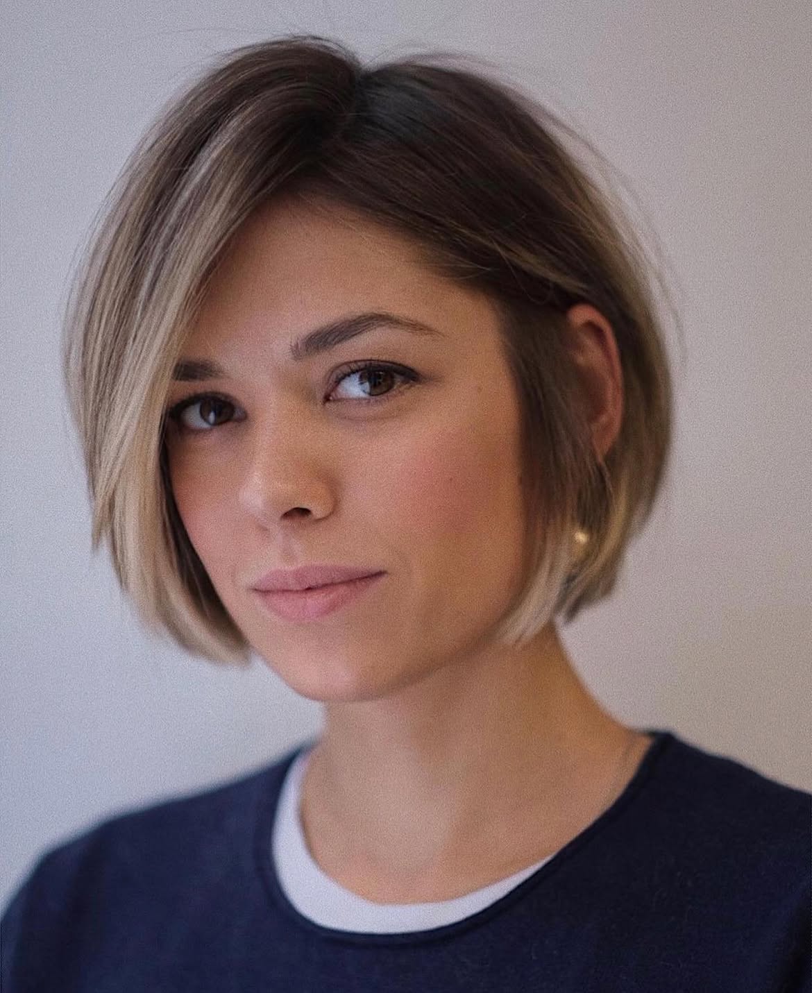 Sleek Side Part Bob With Soft Ash Blonde Highlights