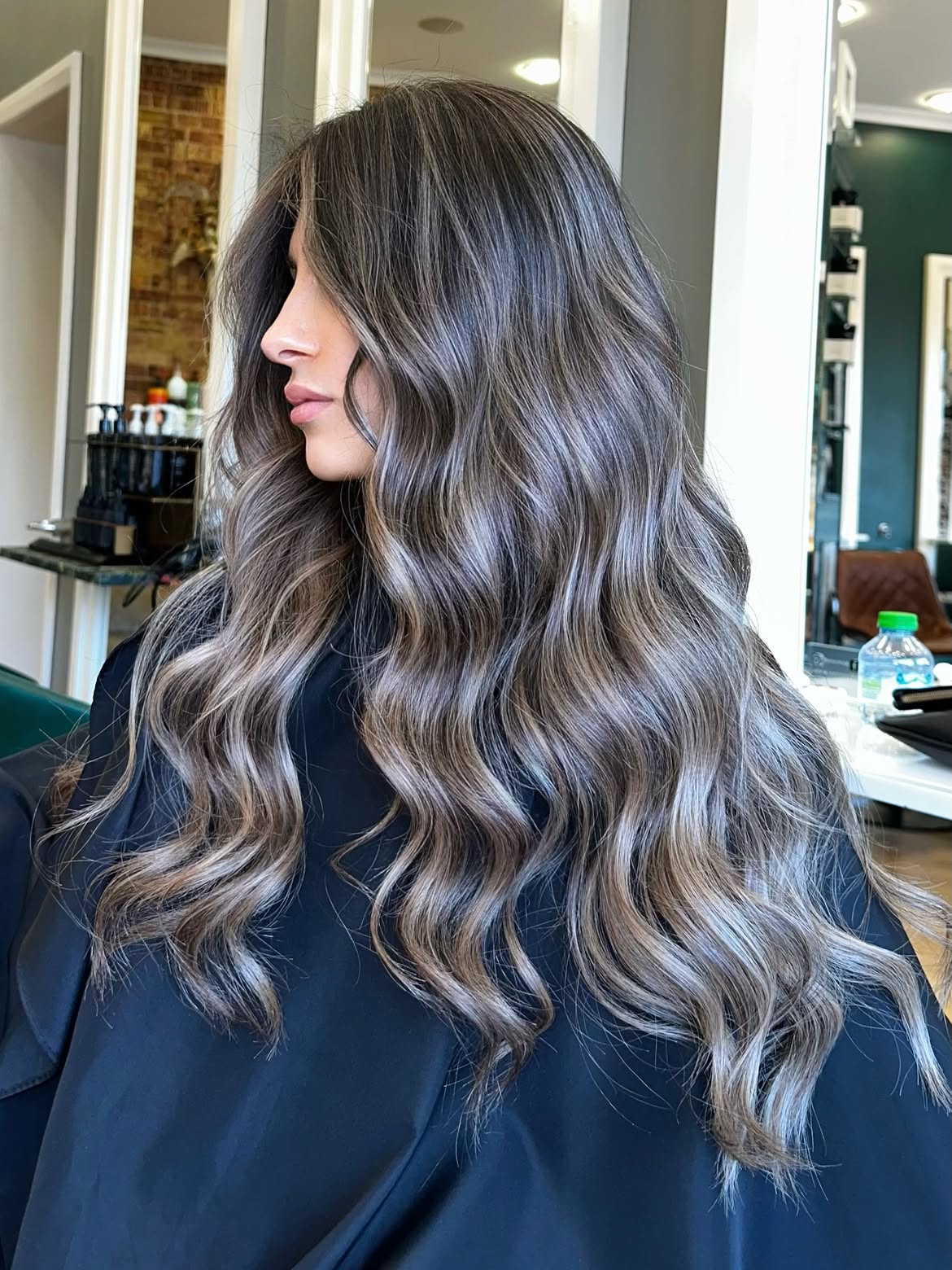 Smoky Ash Balayage On Dark Wavy Hair