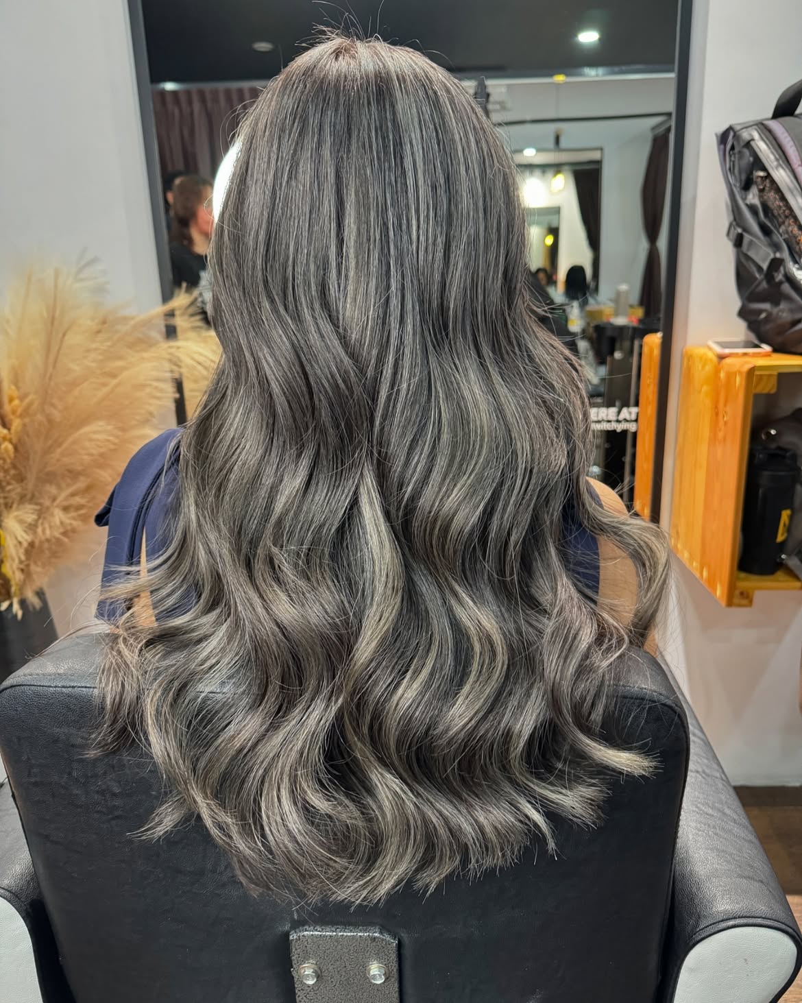 Smoky Ash Blonde Waves With Dimensional Highlights
