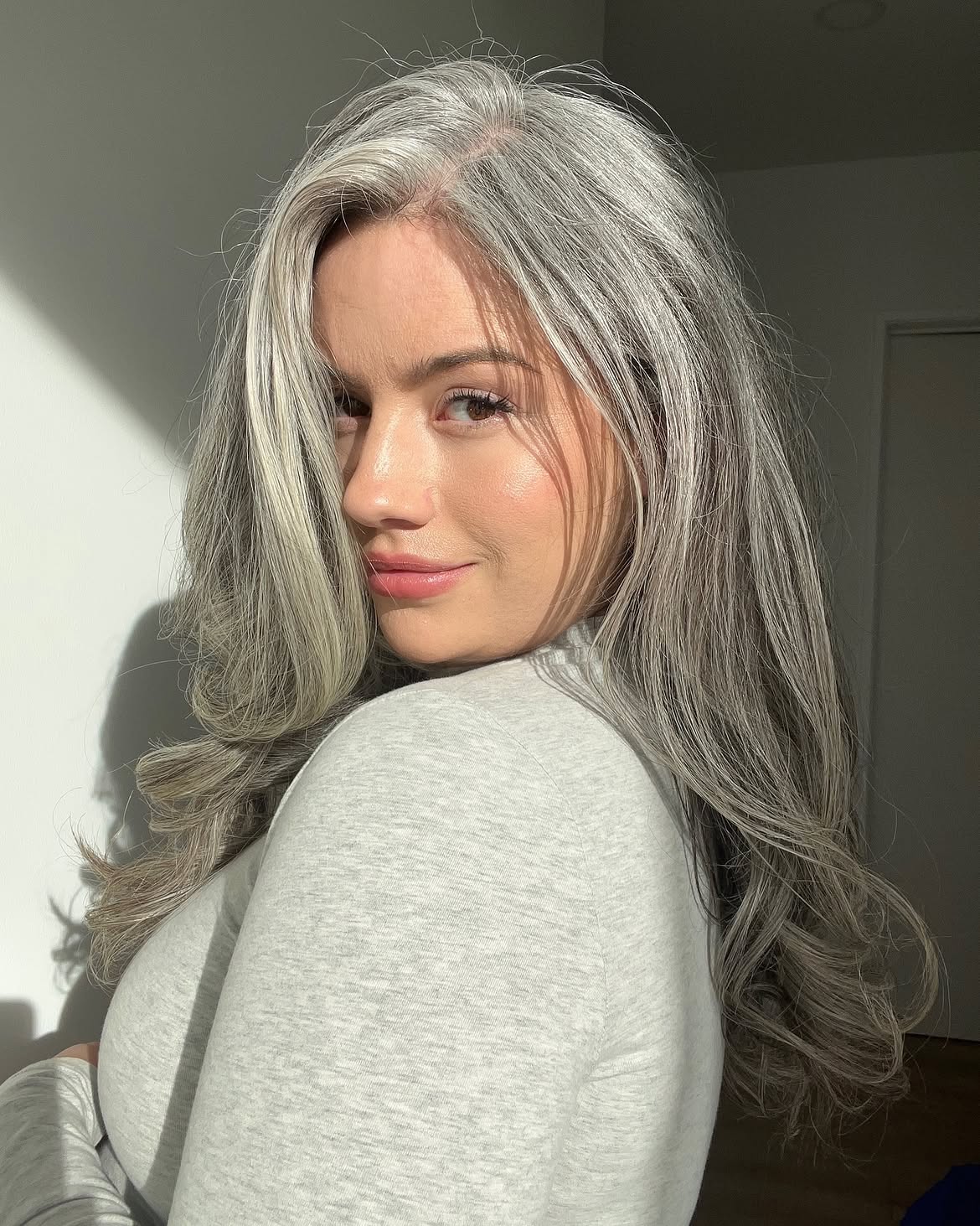 Smoky Silver Waves With Face Framing Layers