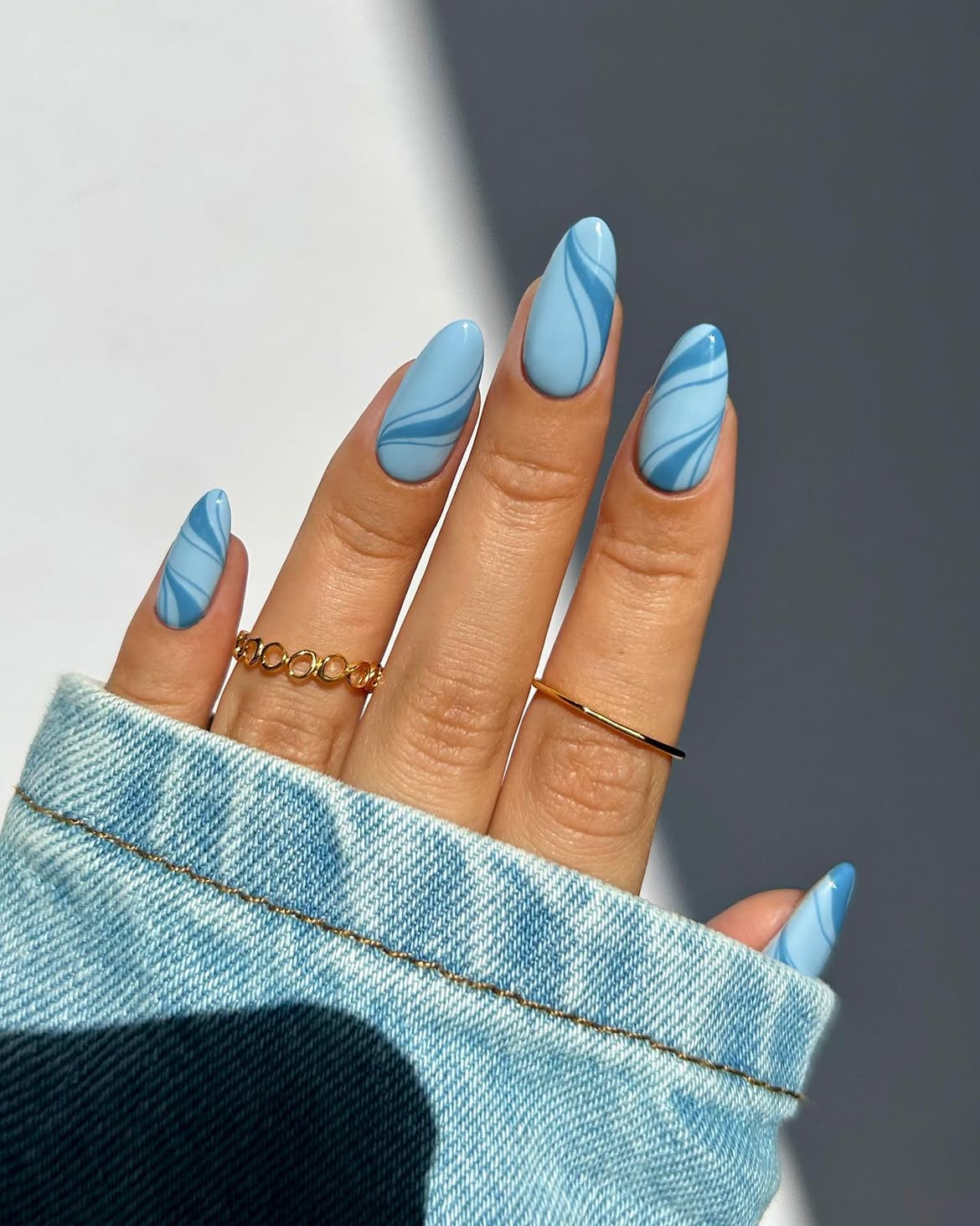 Soft Blue Swirl Almond Nails