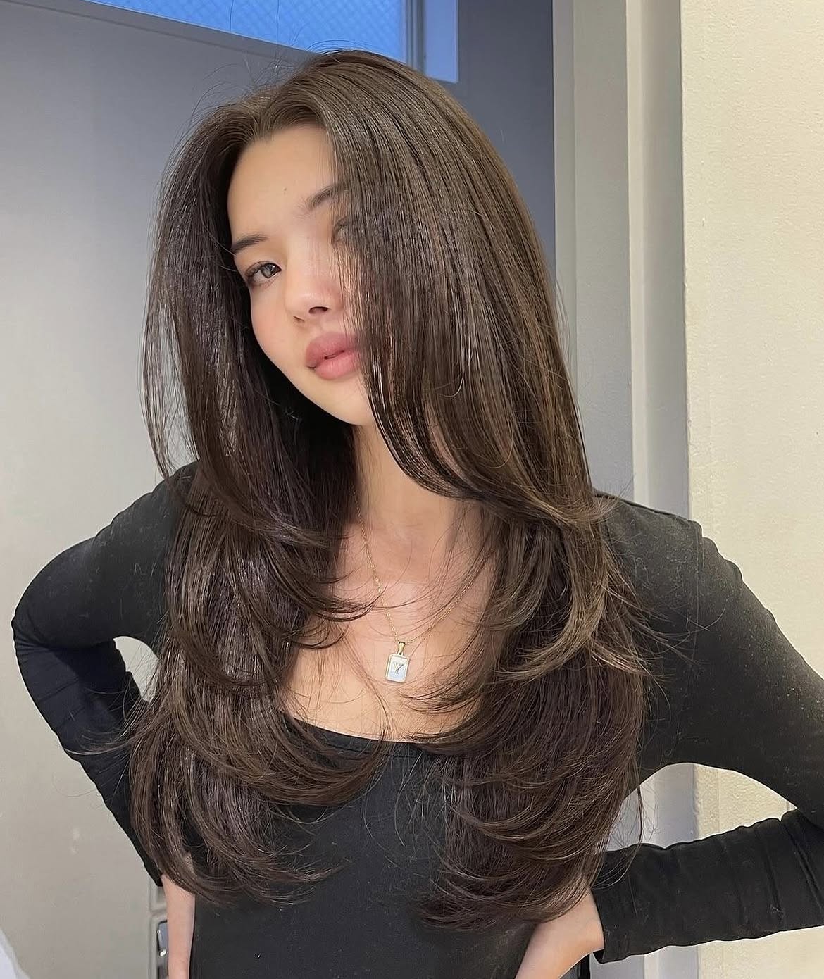 Soft Butterfly Layers With Long Curtain Bangs