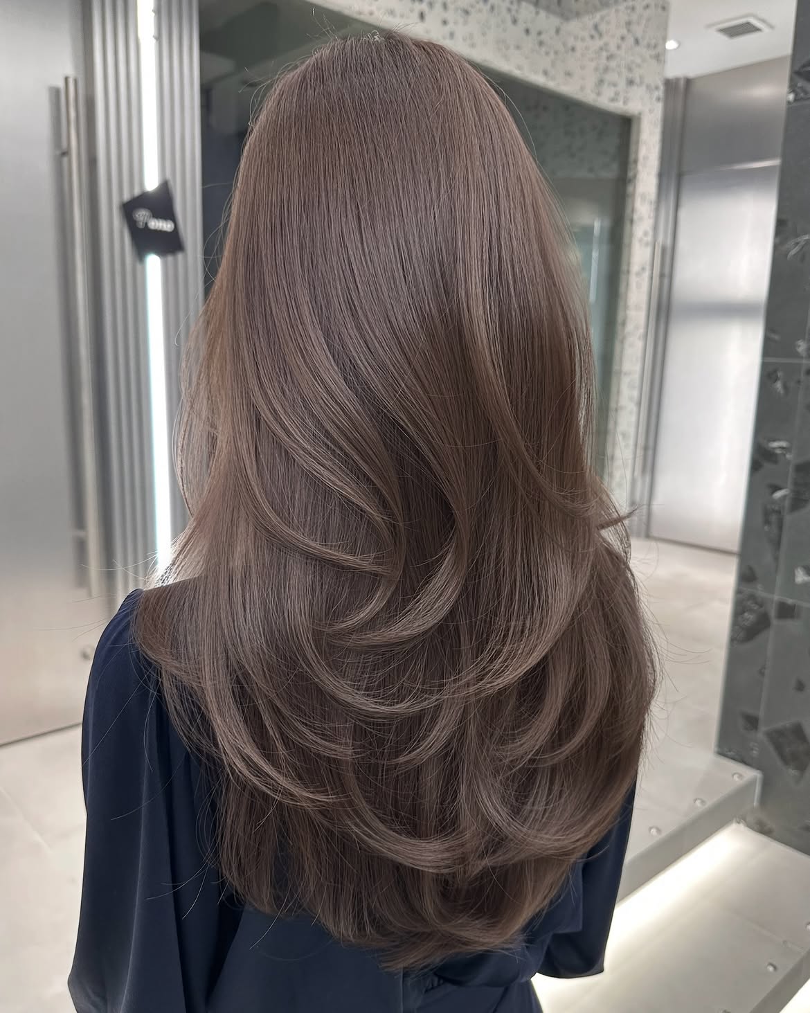 Soft Cascading Layers On Cool Mushroom Brown Hair