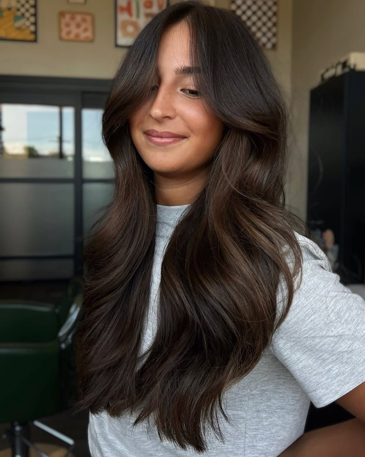 Soft Curtain Bangs On Voluminous Espresso Layers