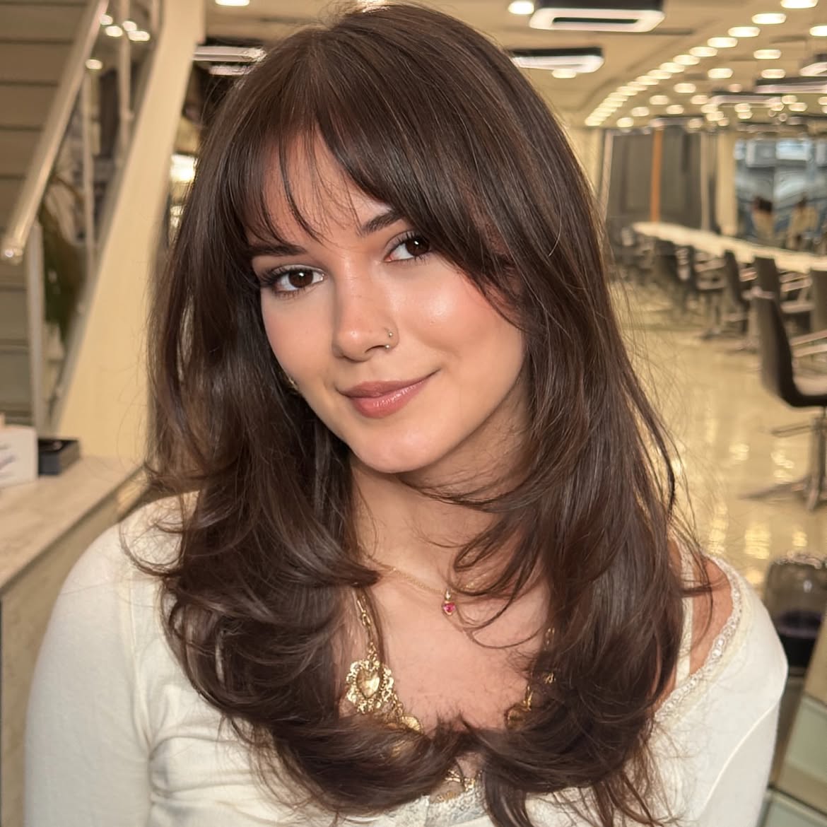 Soft Curtain Bangs With Layered Brunette Waves