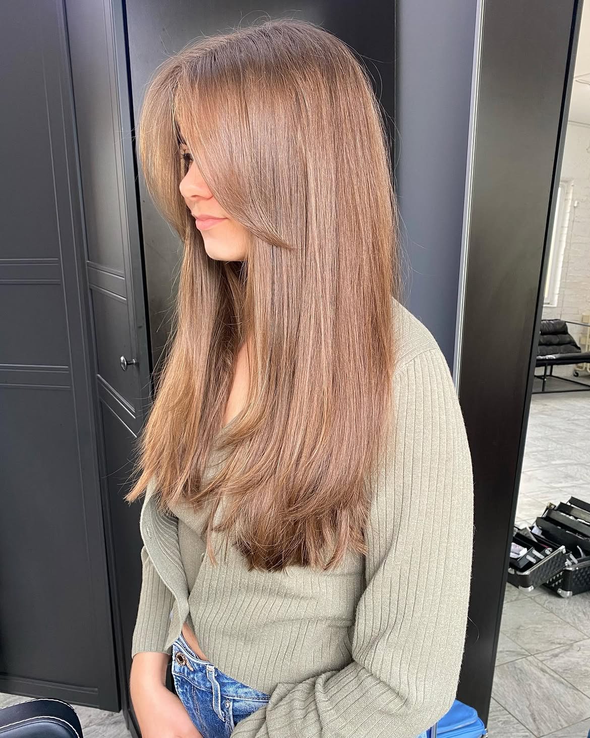 Soft Face-Framing Layers With Caramel Brown Balayage