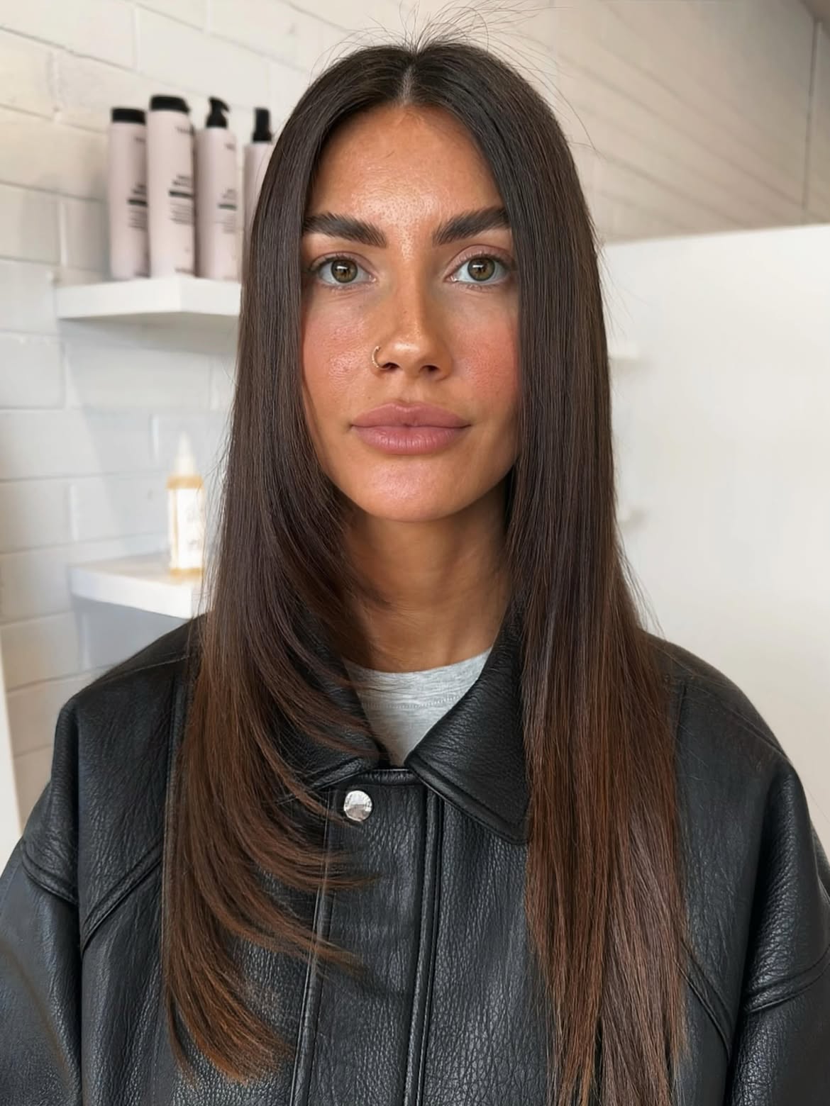 Soft Face-Framing Layers With Subtle Auburn Tones