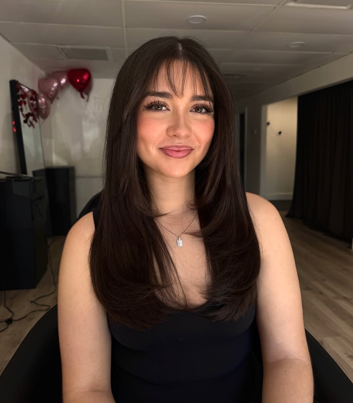 Soft Face-Framing Layers With Wispy Bangs
