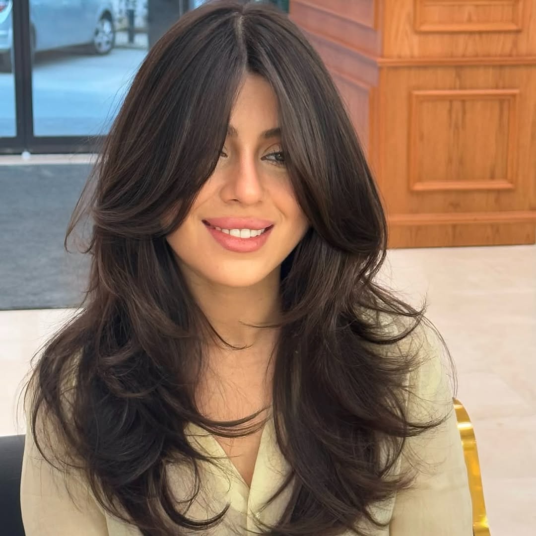 Soft Layered Cut With Face-Framing Curtain Bangs