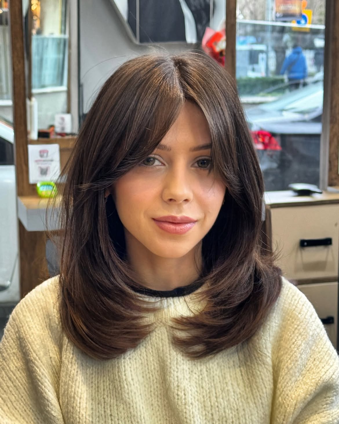 Soft Layered Cut With Side Swept Bangs