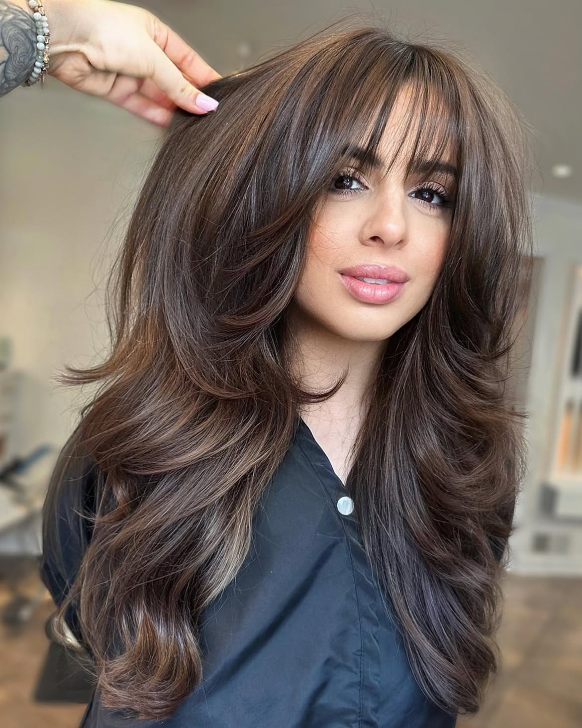 Soft Layered Cut With Wispy Face-Framing Bangs