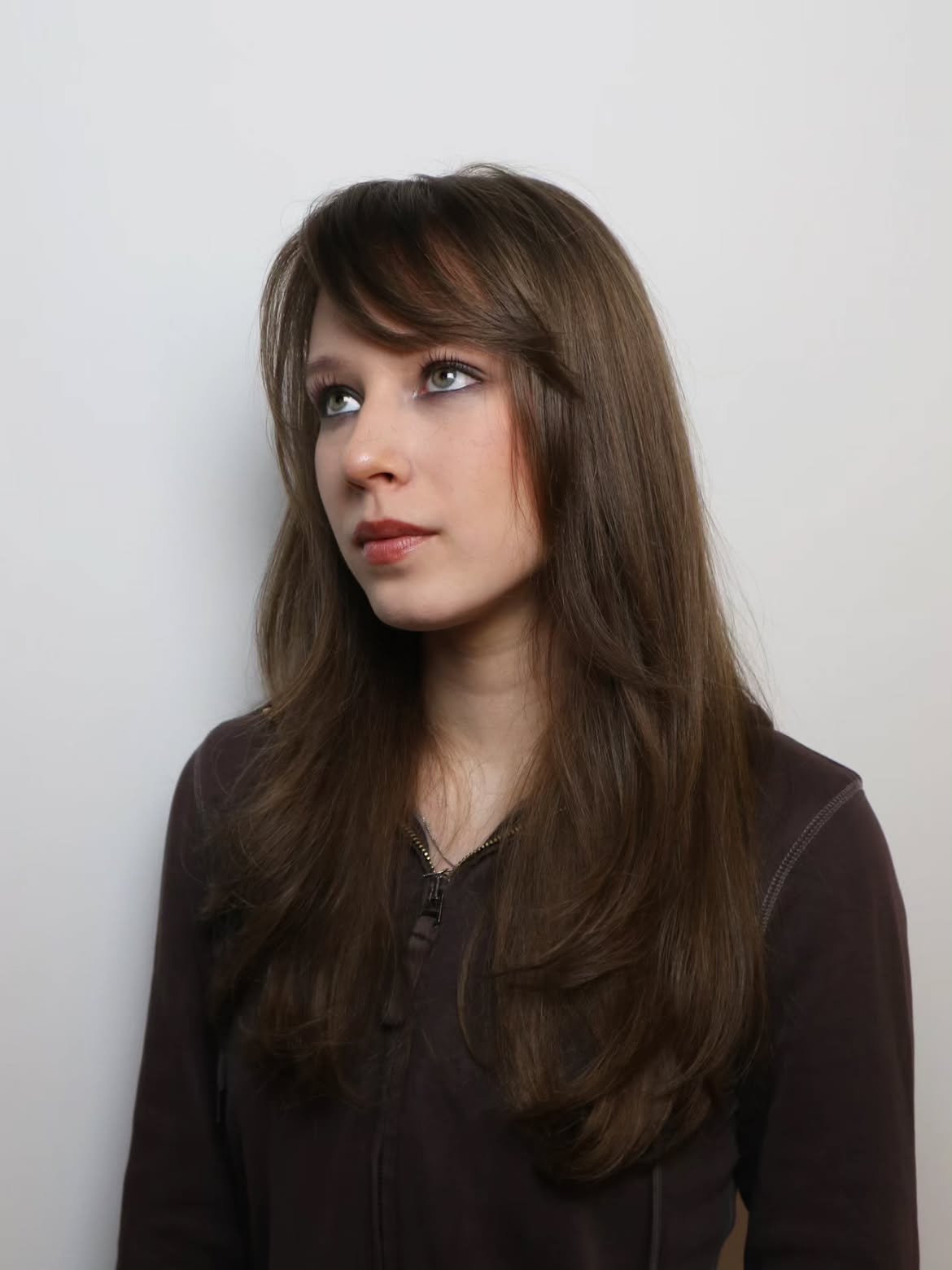 Soft Side Swept Bangs With Layered Brunette Waves