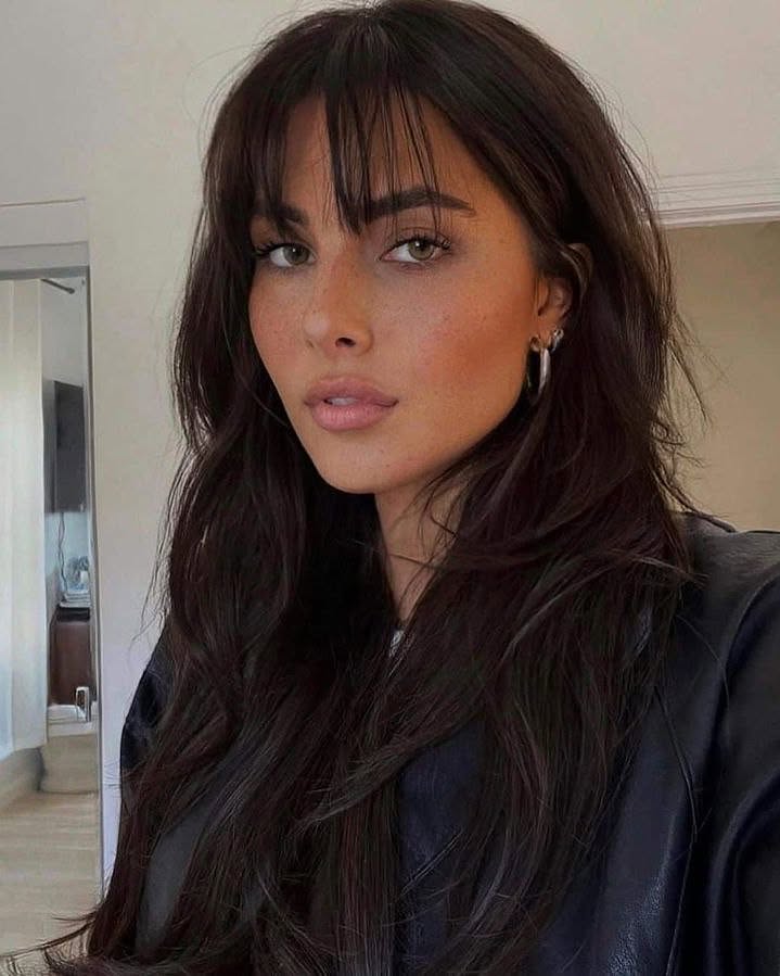 Soft Wispy Bangs With Dark Brown Layered Waves