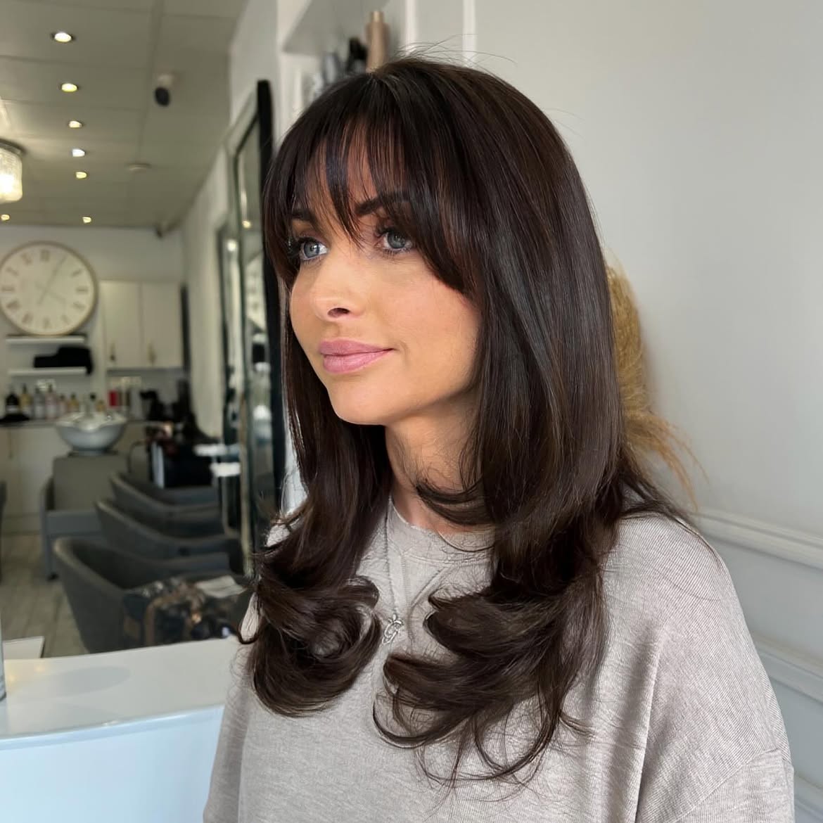 Soft Wispy Bangs With Face-Framing Layers