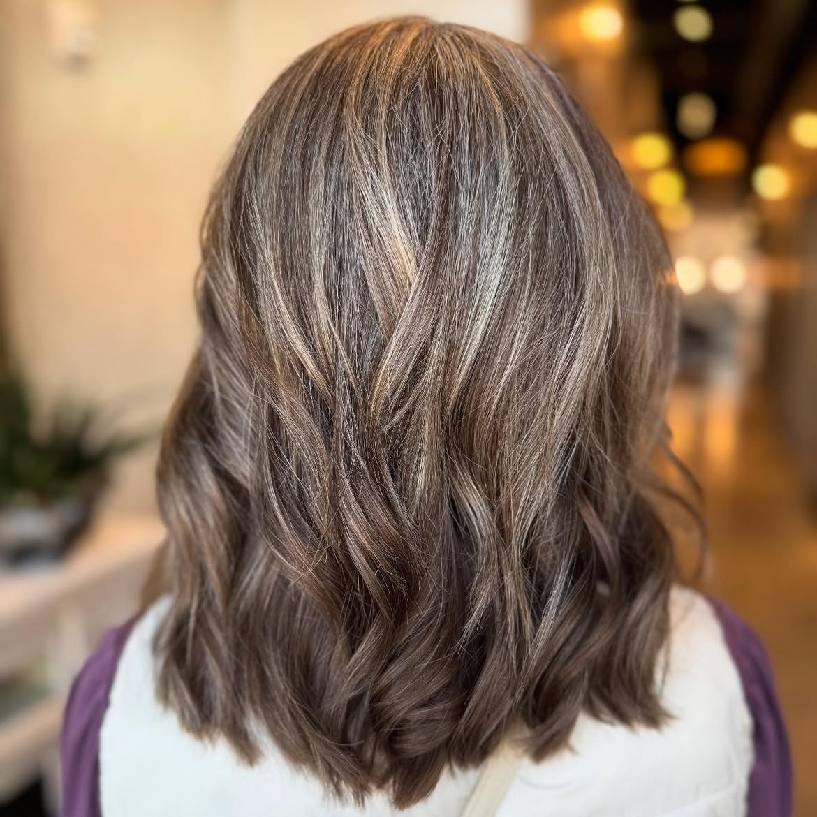 Sophisticated Grey Blending With Soft Blonde Highlights
