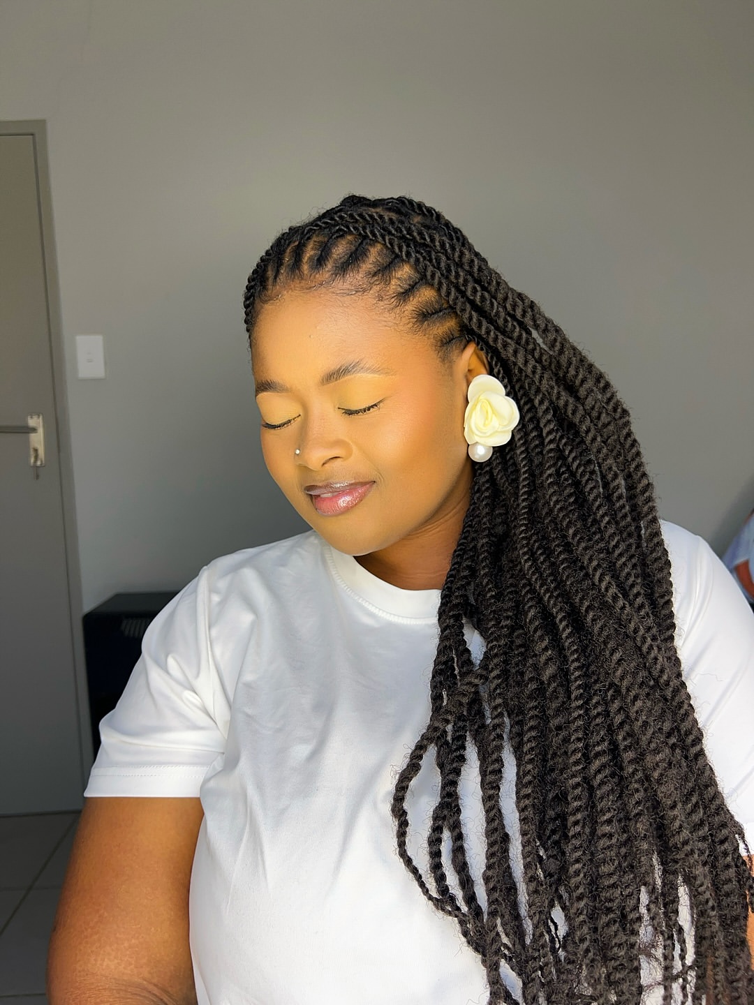Sophisticated Two Strand Twists With Sleek Parting
