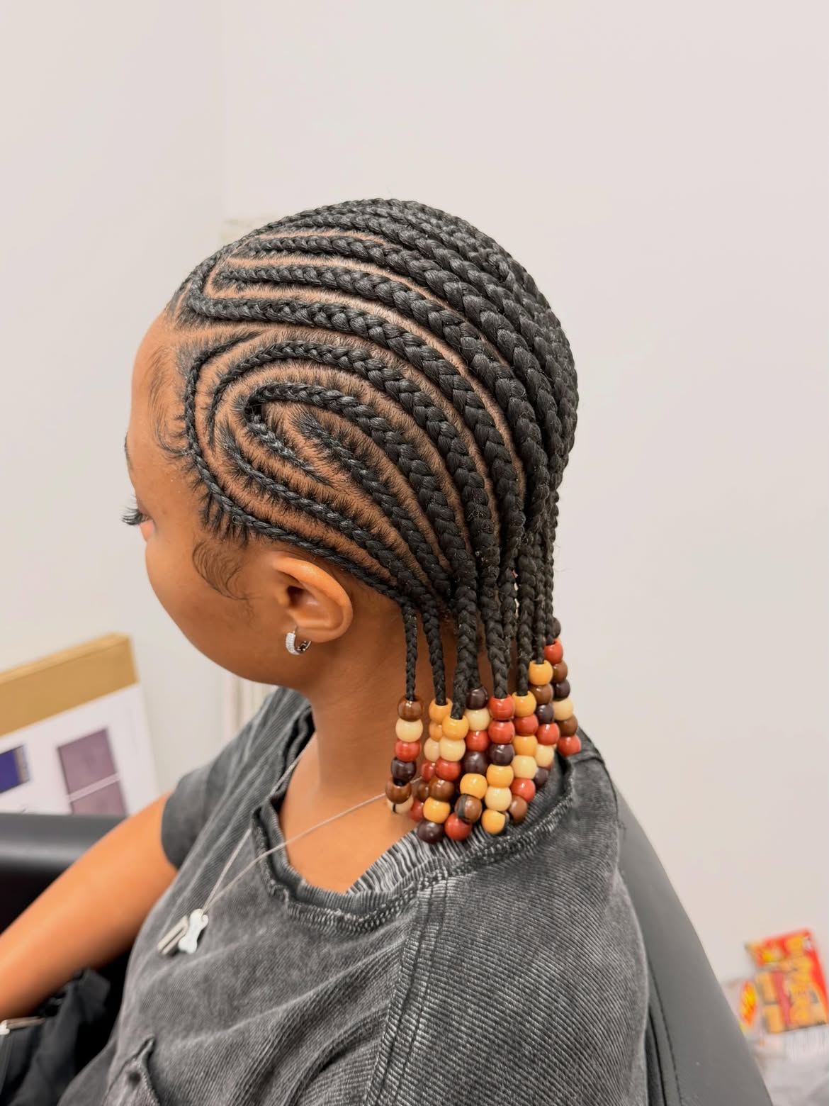 Swirl Pattern Cornrows With Natural Wood Beads