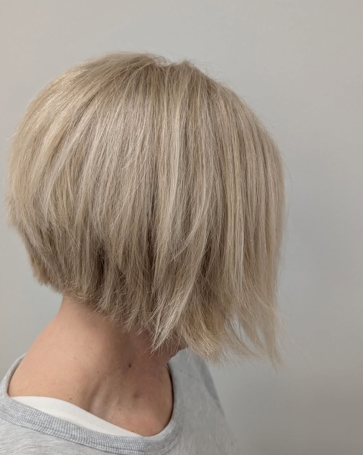 Textured Stacked Bob In Cool Platinum Blonde