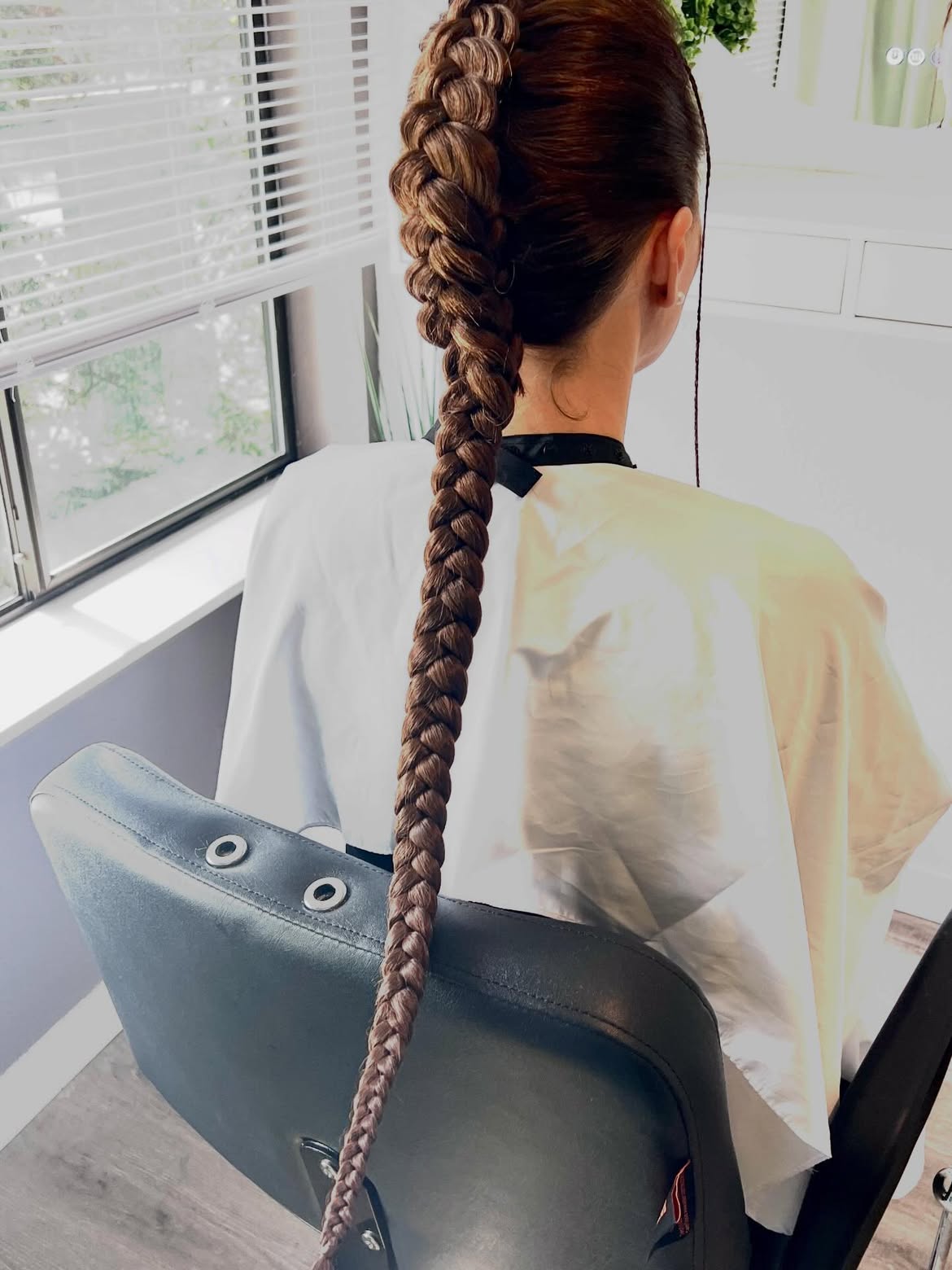Thick Fishtail Braid With Deep Auburn Highlights