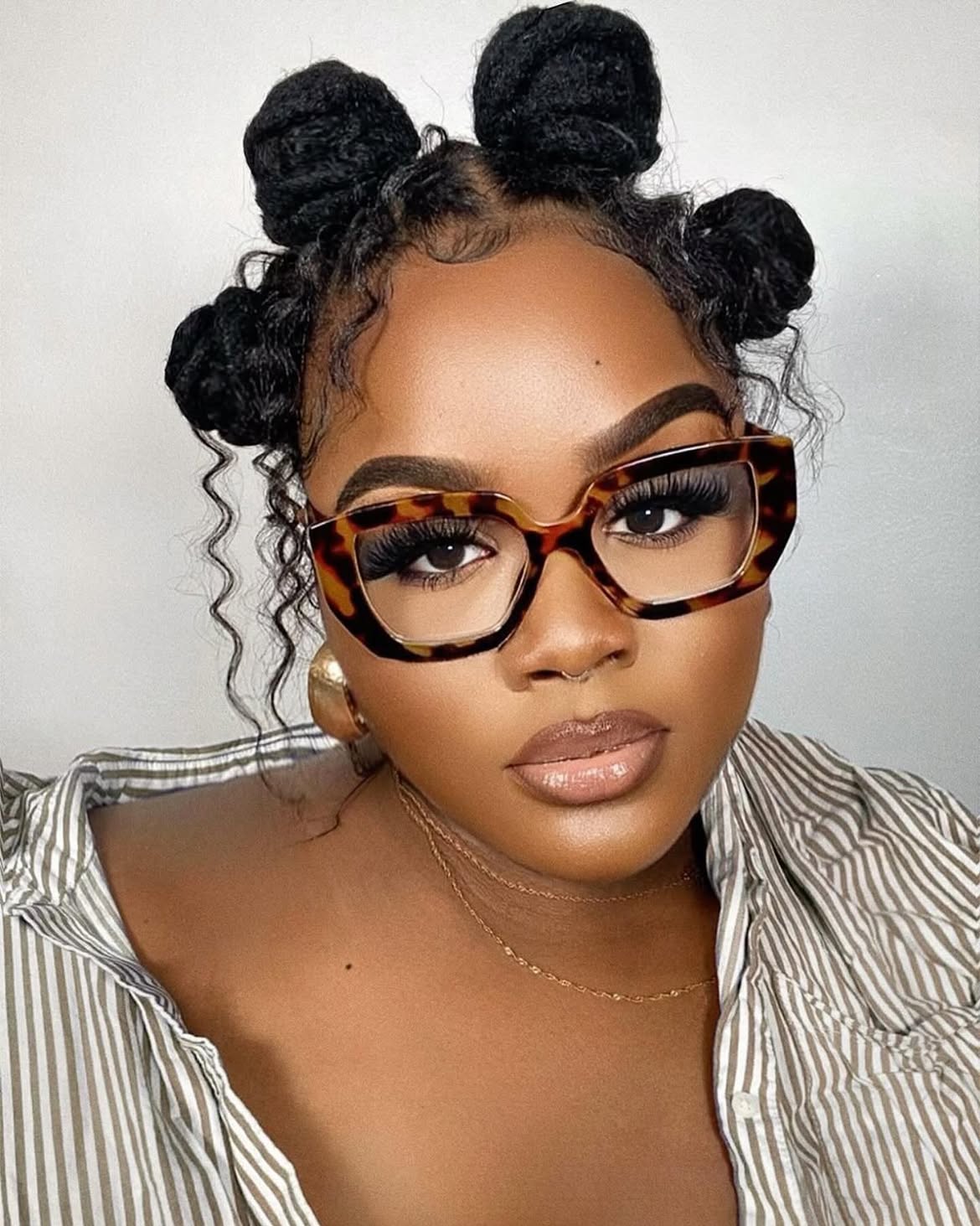 Top Knot Bantu Knots With Curly Tendrils