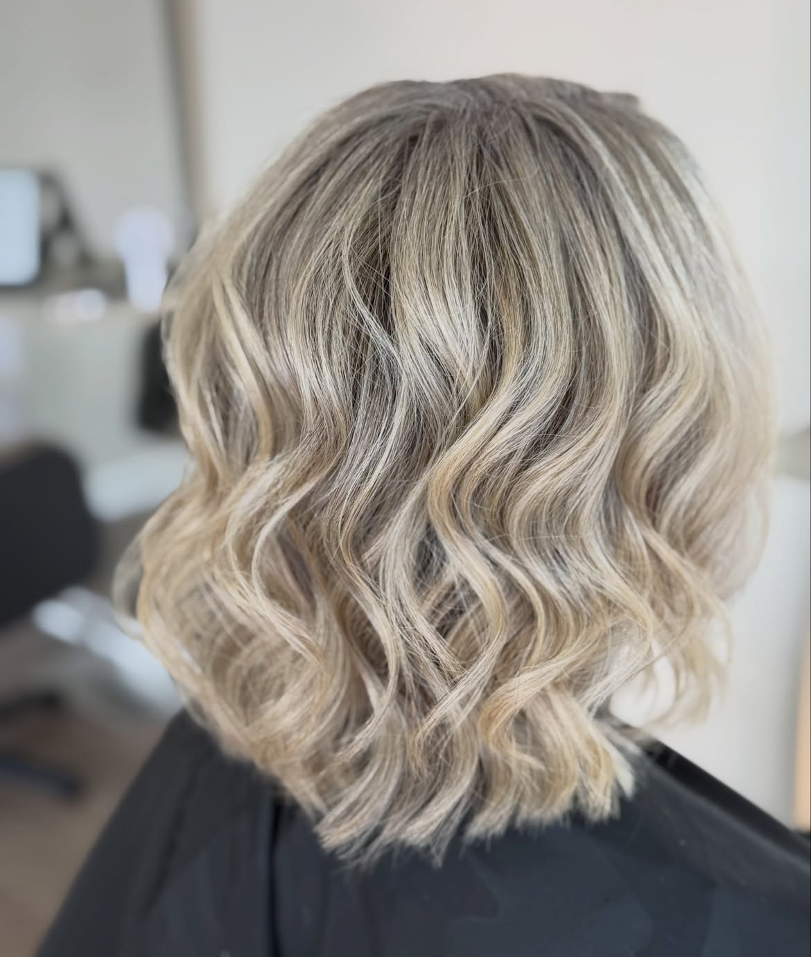 Tousled Honey Blonde Bob With Loose Waves