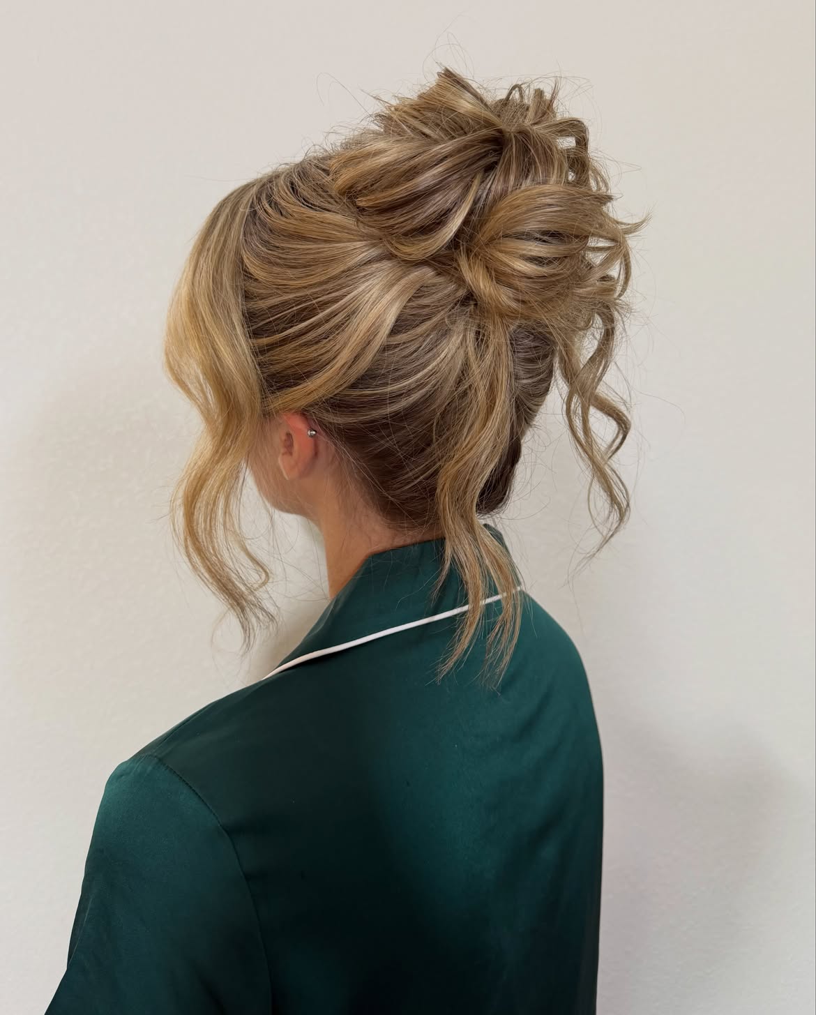 Tousled Updo With Loose Face-Framing Tendrils