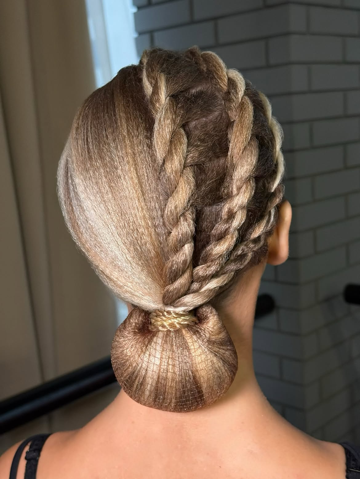 Twisted Crown Braid With Low Bun