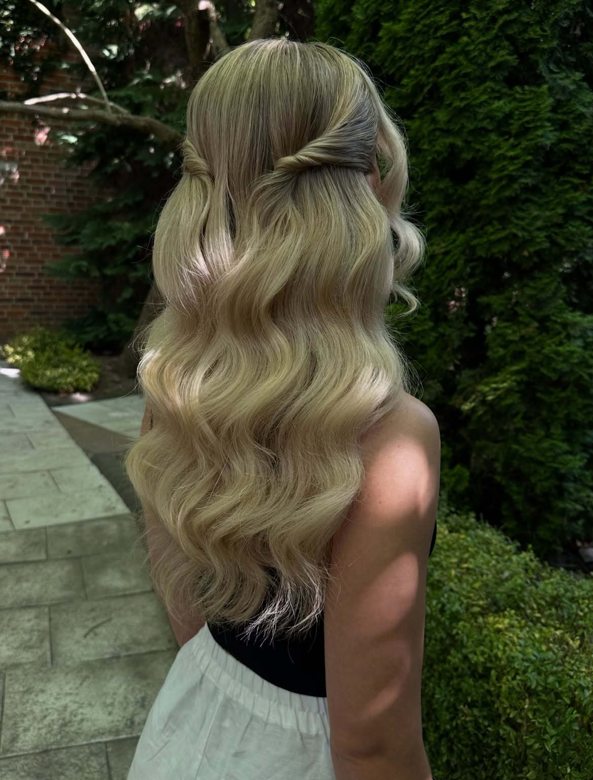 Twisted Half-Up With Loose Waves