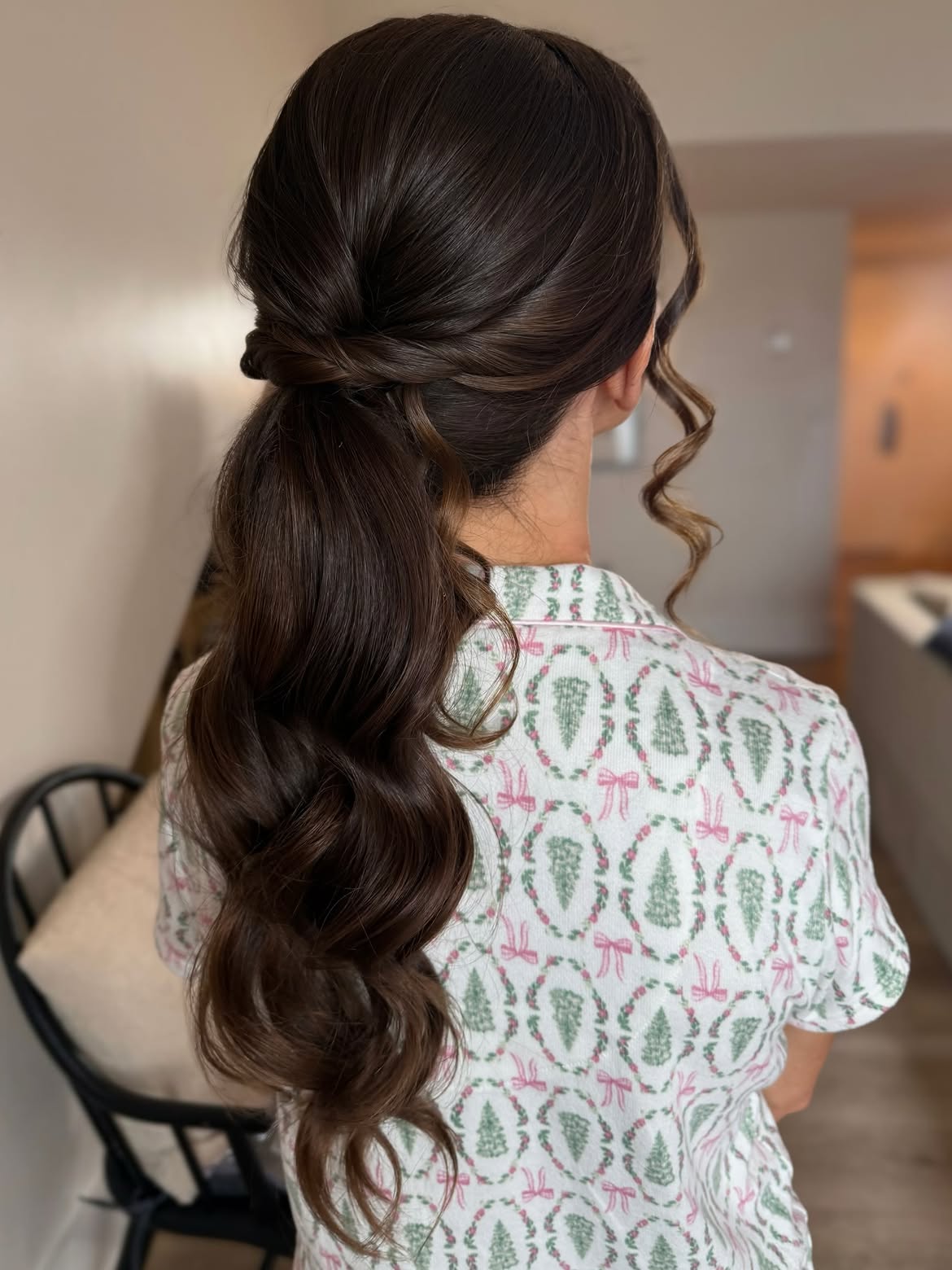 Twisted Low Ponytail With Cascading Waves
