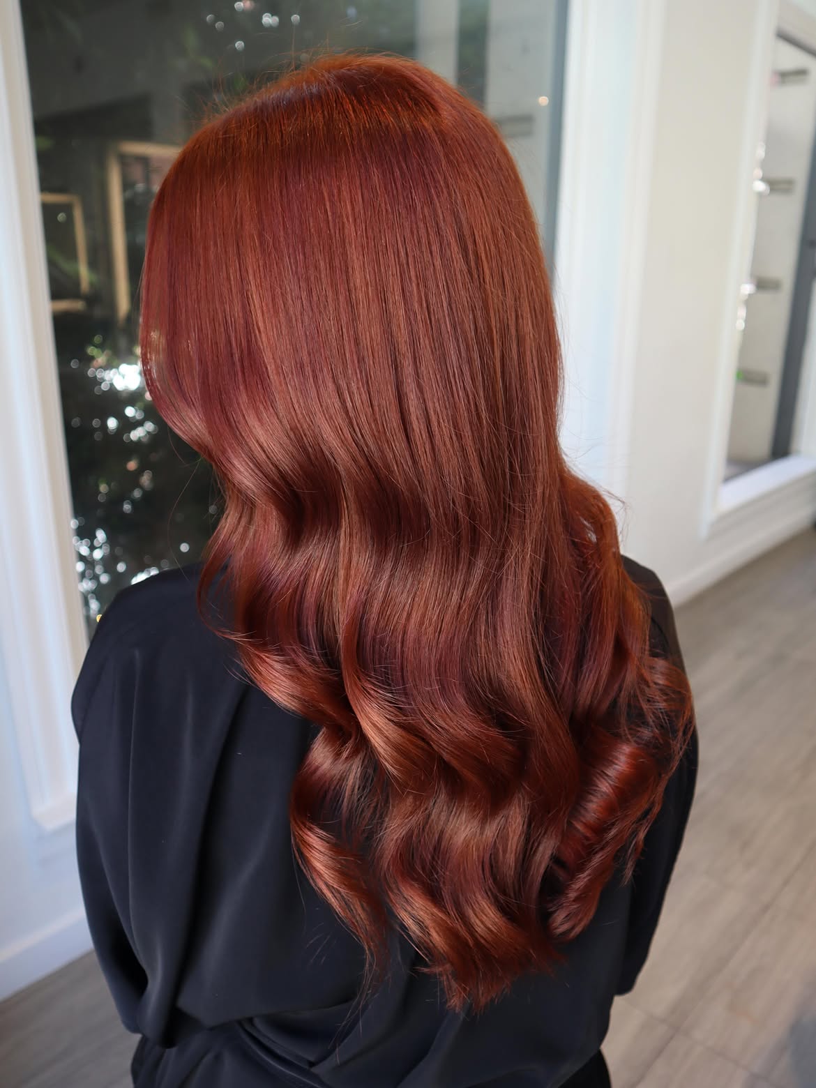 Vibrant Auburn Waves With Face-Framing Layers