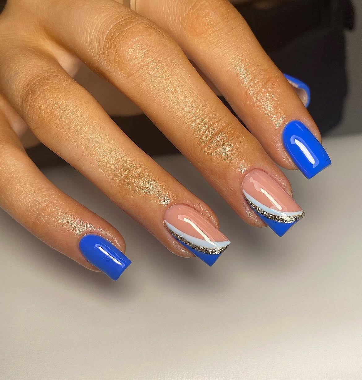 Vibrant Blue & Nude French Tip Nails