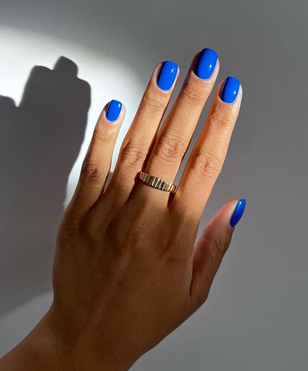 Vivid Cobalt Blue Glossy Oval Nails
