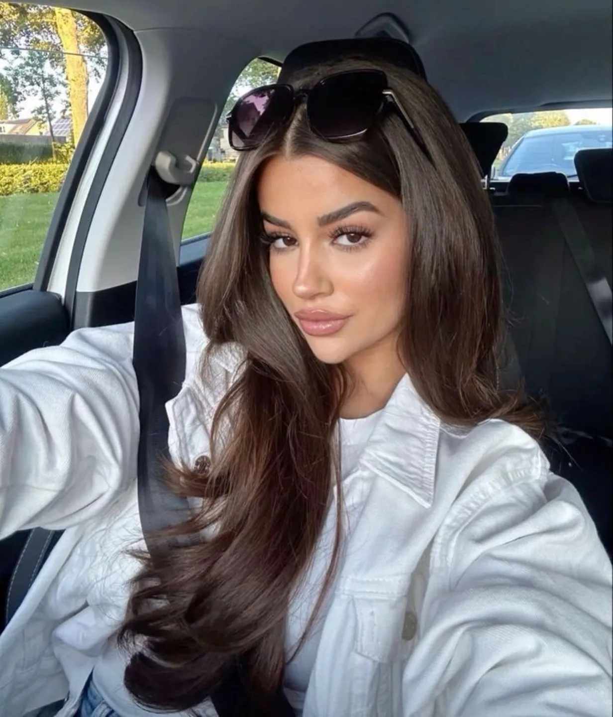 Voluminous Blowout Layers On Rich Chocolate Brown Hair