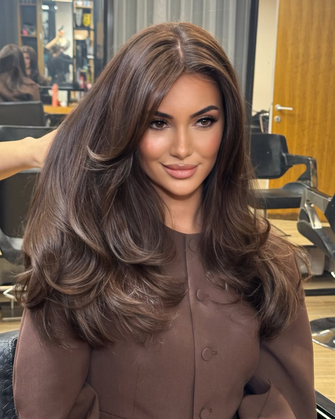 Voluminous Blowout With Face Framing Layers For Brunettes
