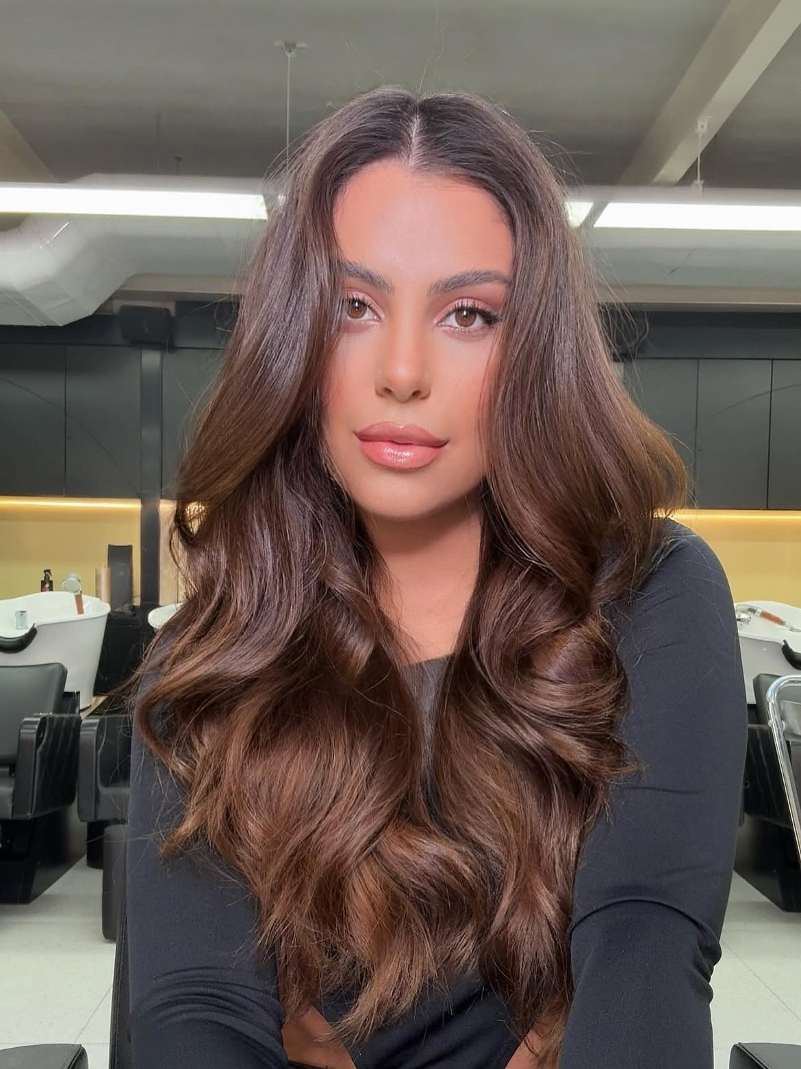 Voluminous Brunette Blowout With Face Framing Layers
