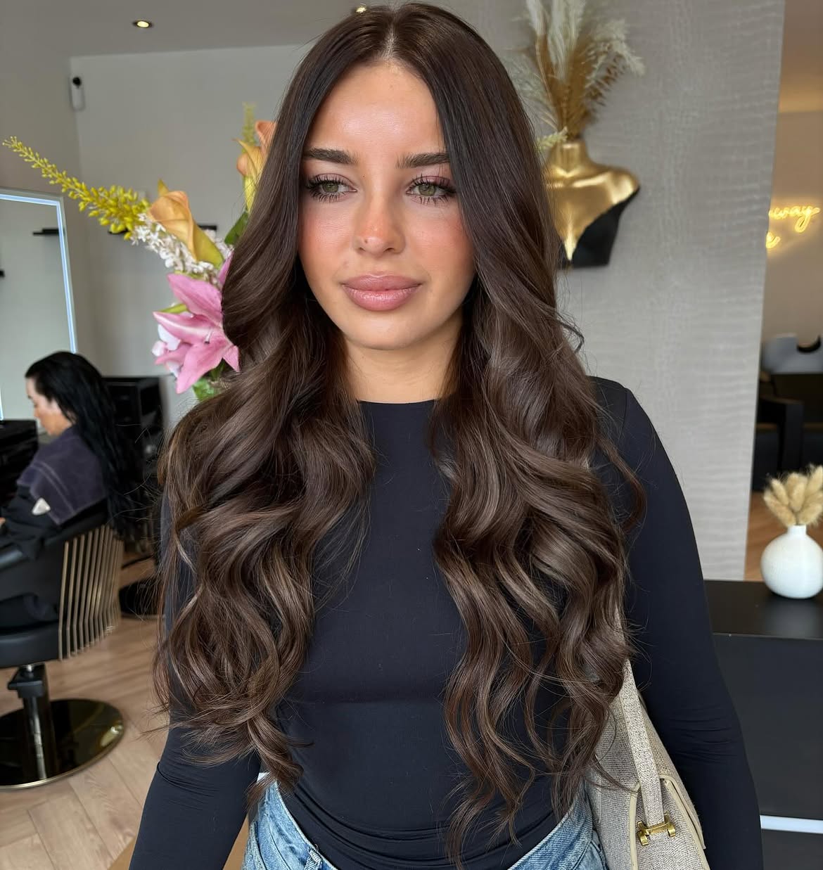 Voluminous Brunette Blowout With Soft Face Framing Layers