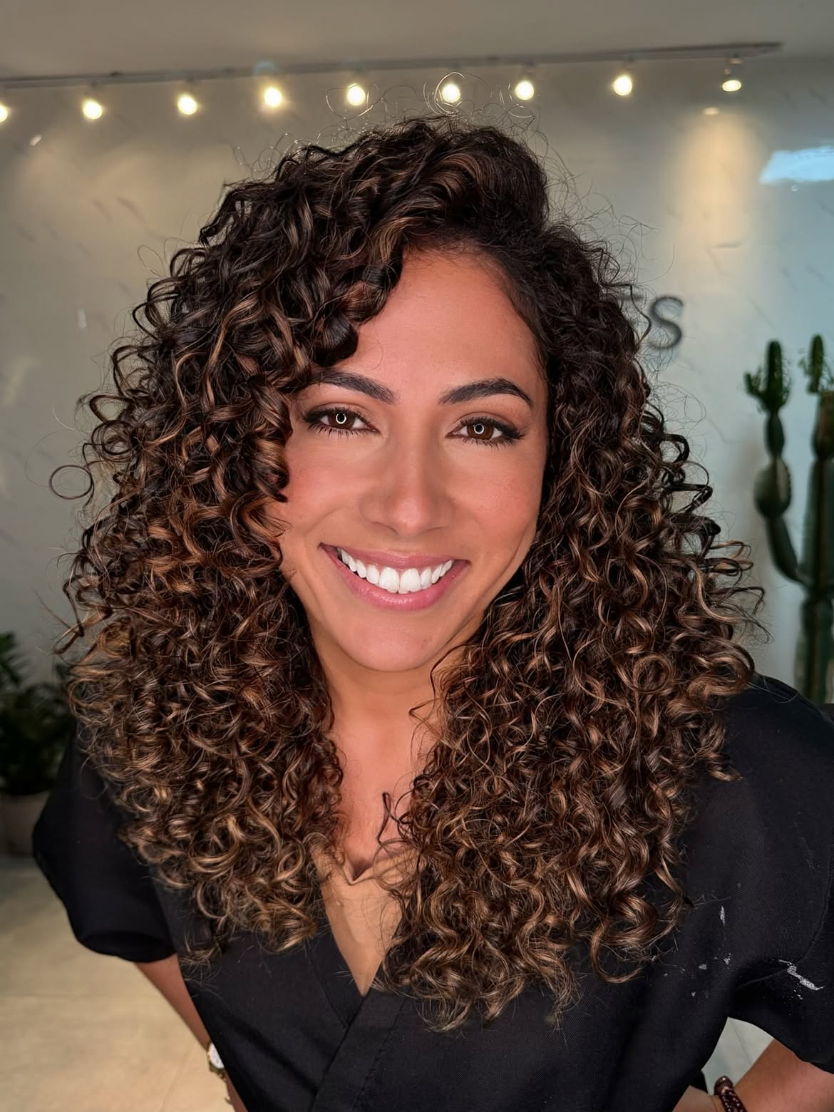 Voluminous Caramel Highlighted Brown Curly Layers