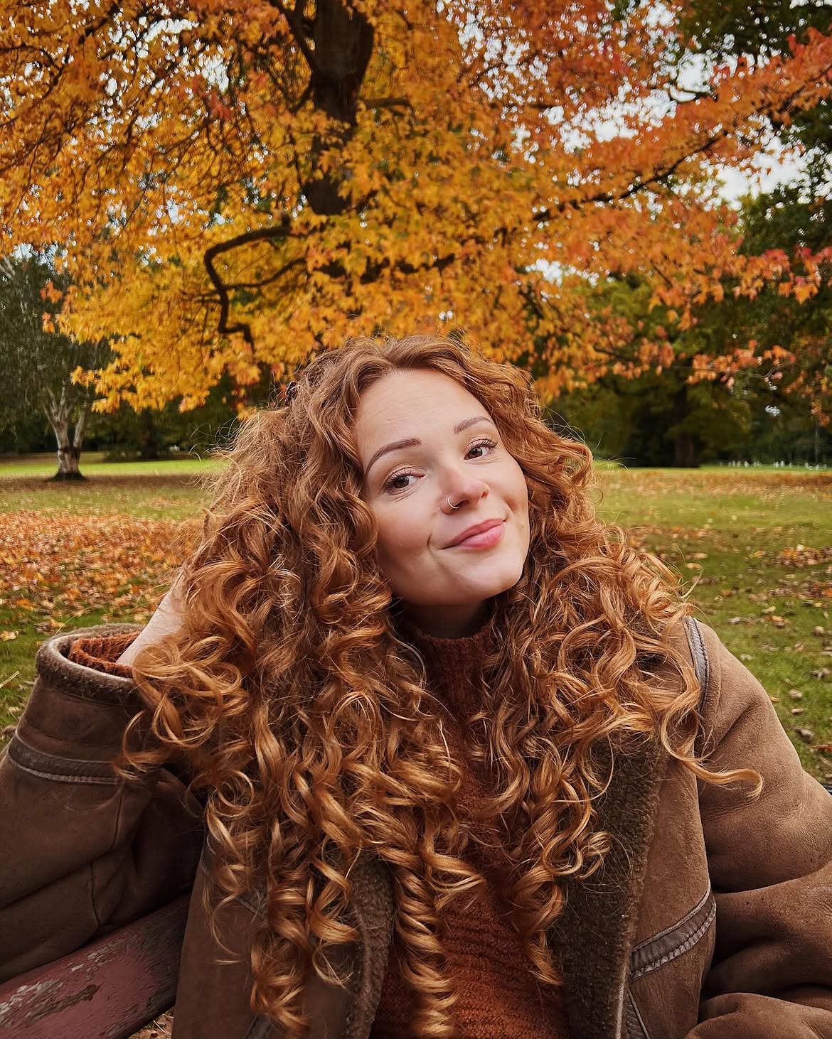 Voluminous Copper Curly Layers For Long Hair