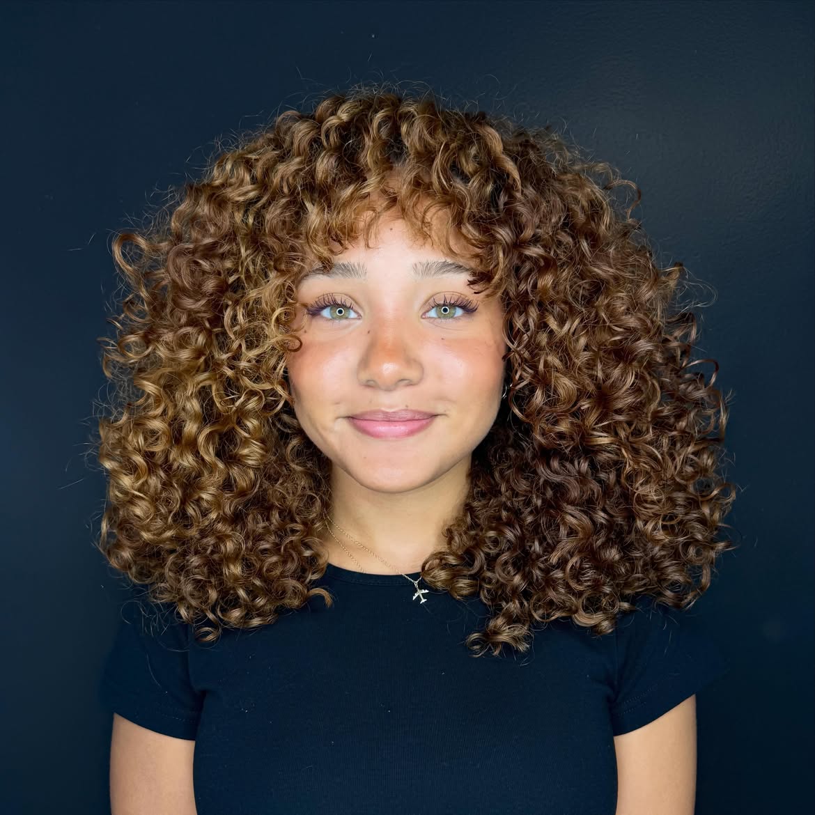 Voluminous Curly Shag With Curly Bangs