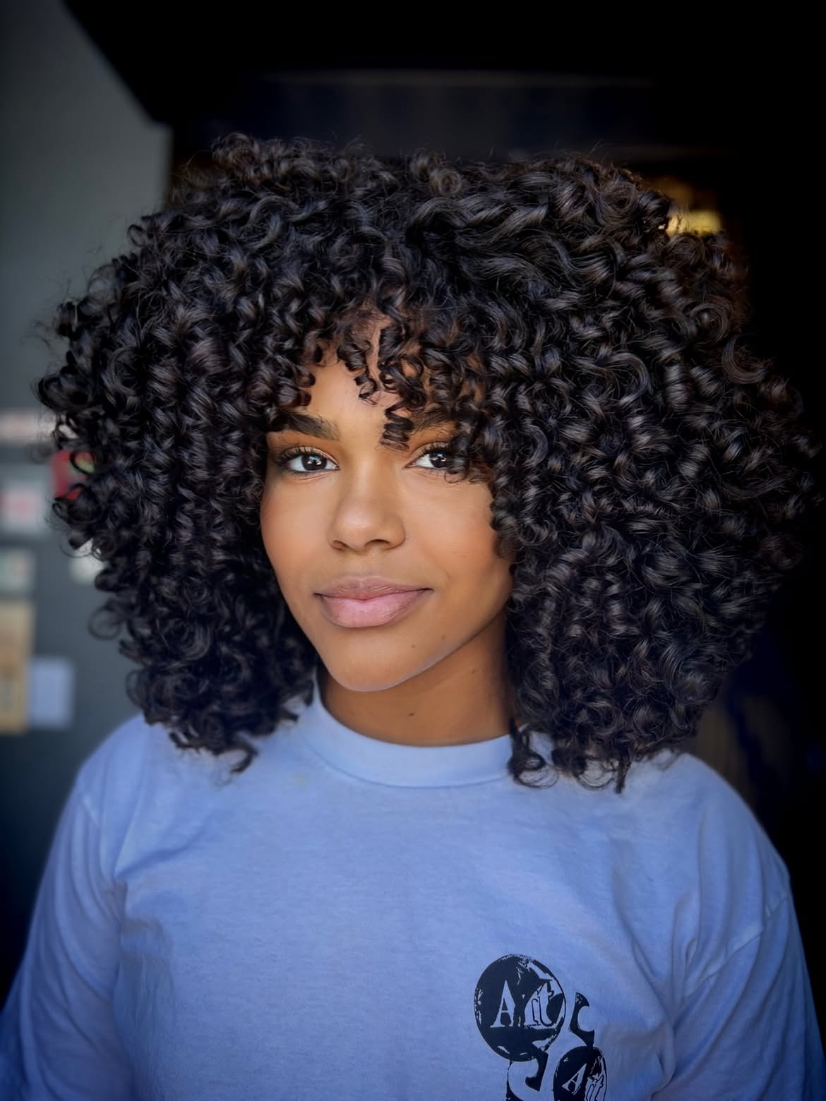Voluminous Curly Shag With Full Curly Bangs