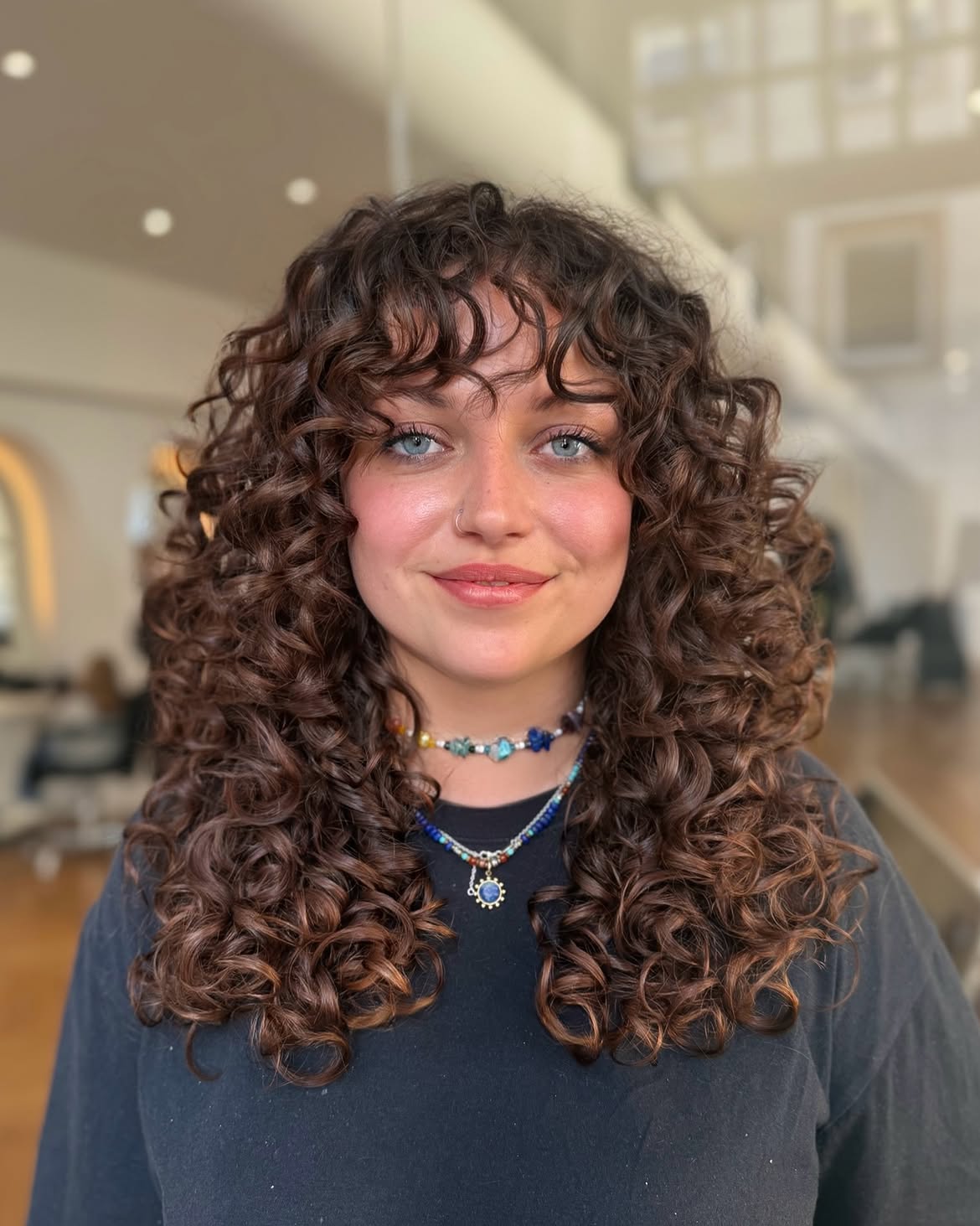 Voluminous Curly Shag With Piecey Curly Bangs
