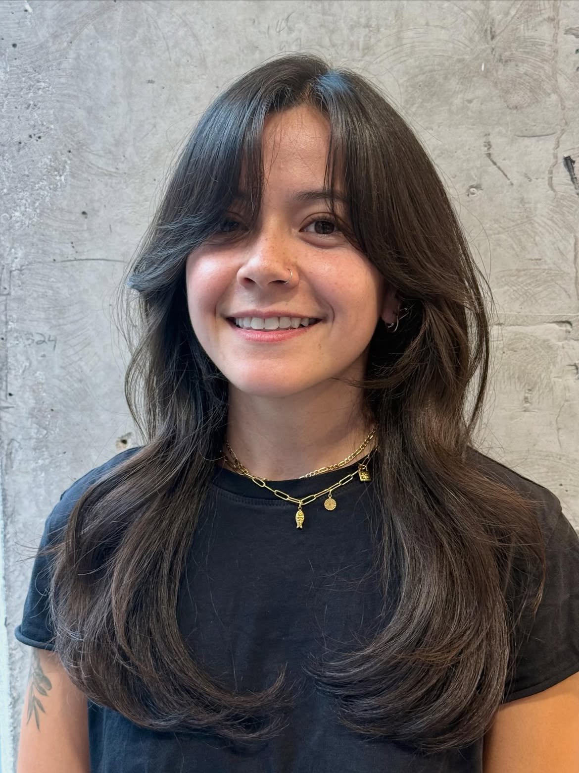 Voluminous Dark Brown Hair With Side Swept Bangs
