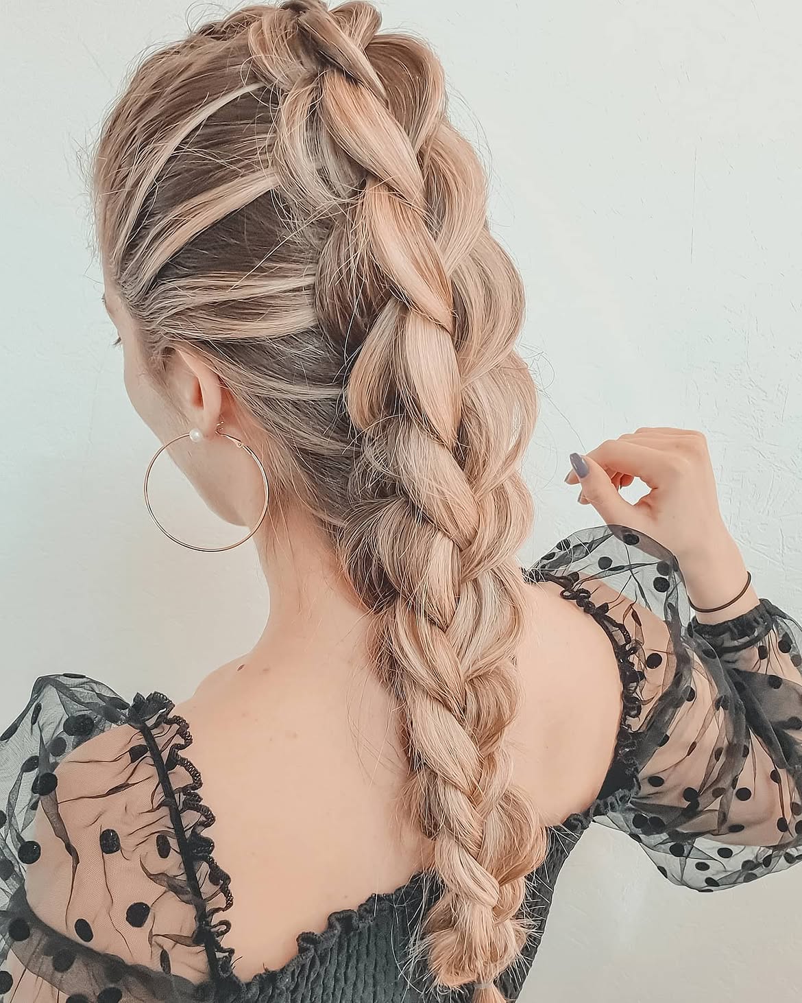 Voluminous Dutch Braid With Face-Framing Strands