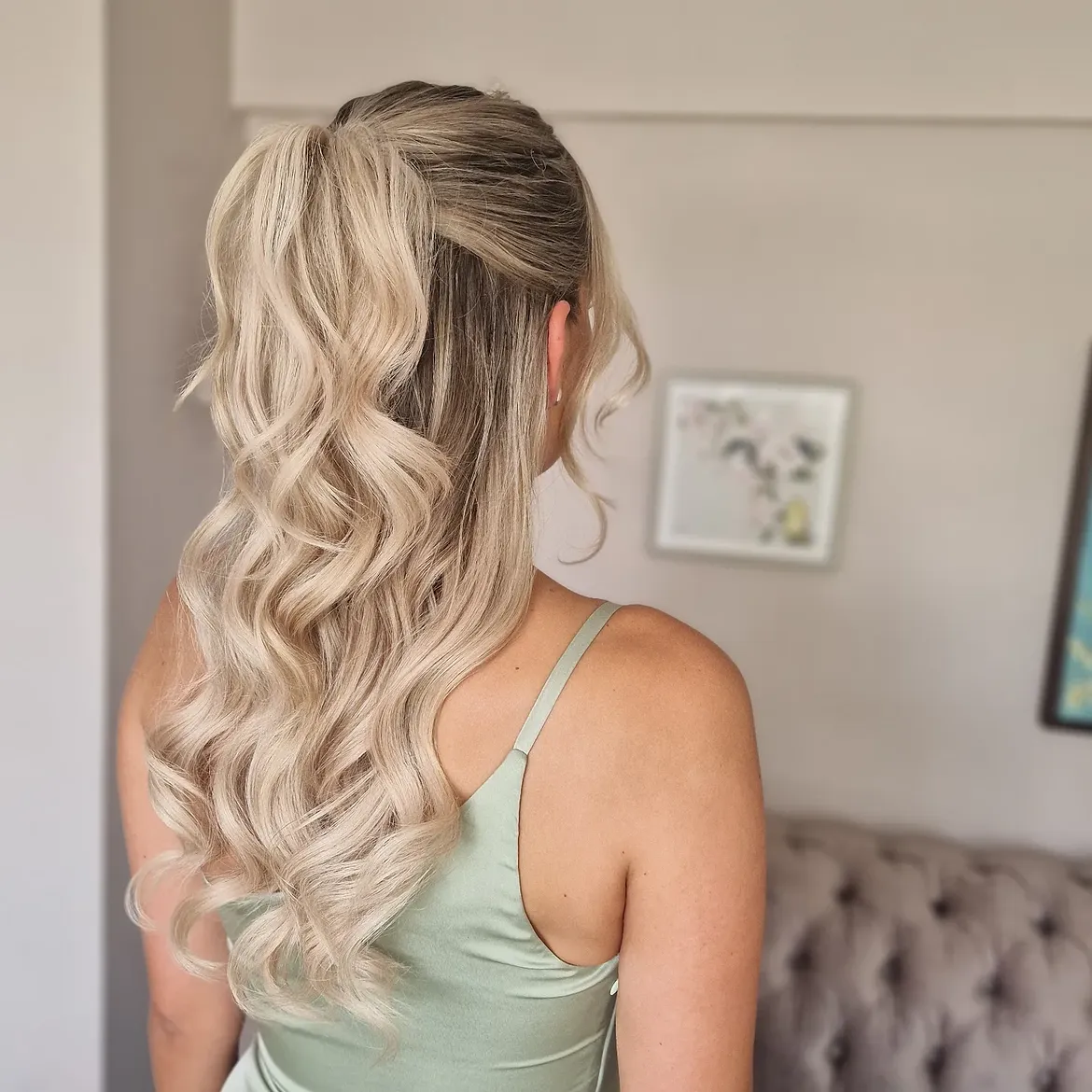 Voluminous Half-Up High Ponytail With Loose Curls