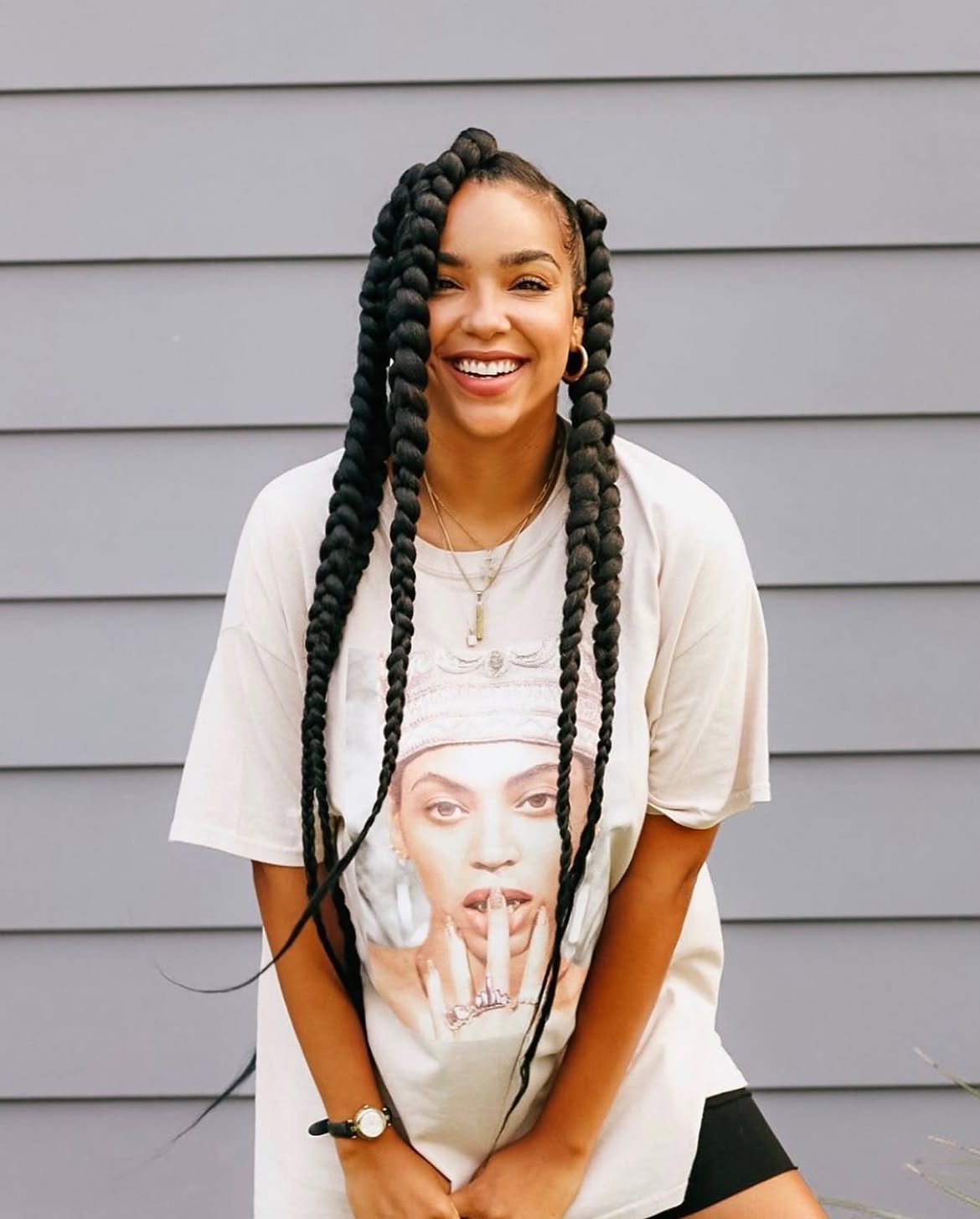 Voluminous Jumbo Box Braids With A Deep Side Part