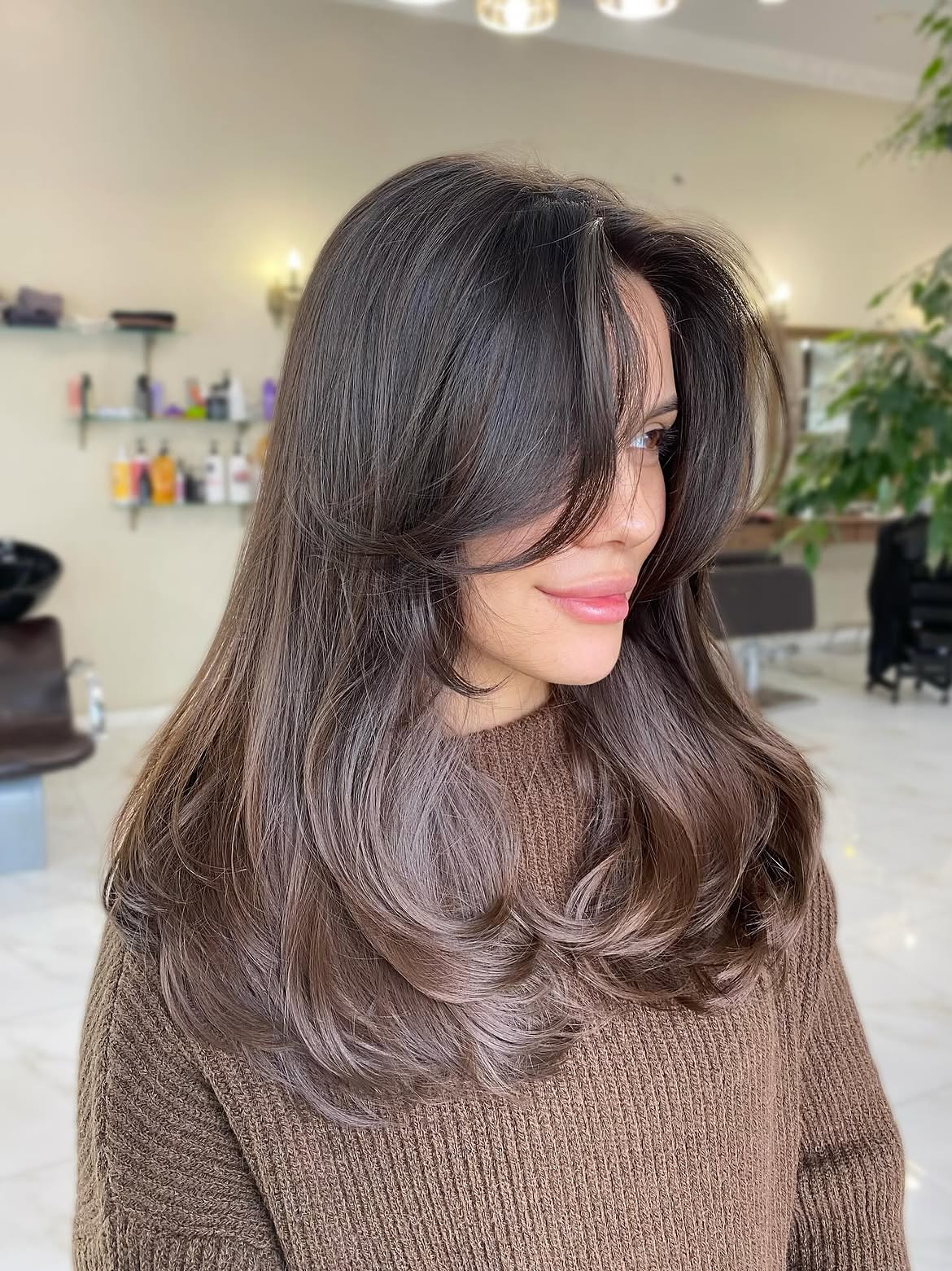 Voluminous Layers With Soft Face-Framing Bangs