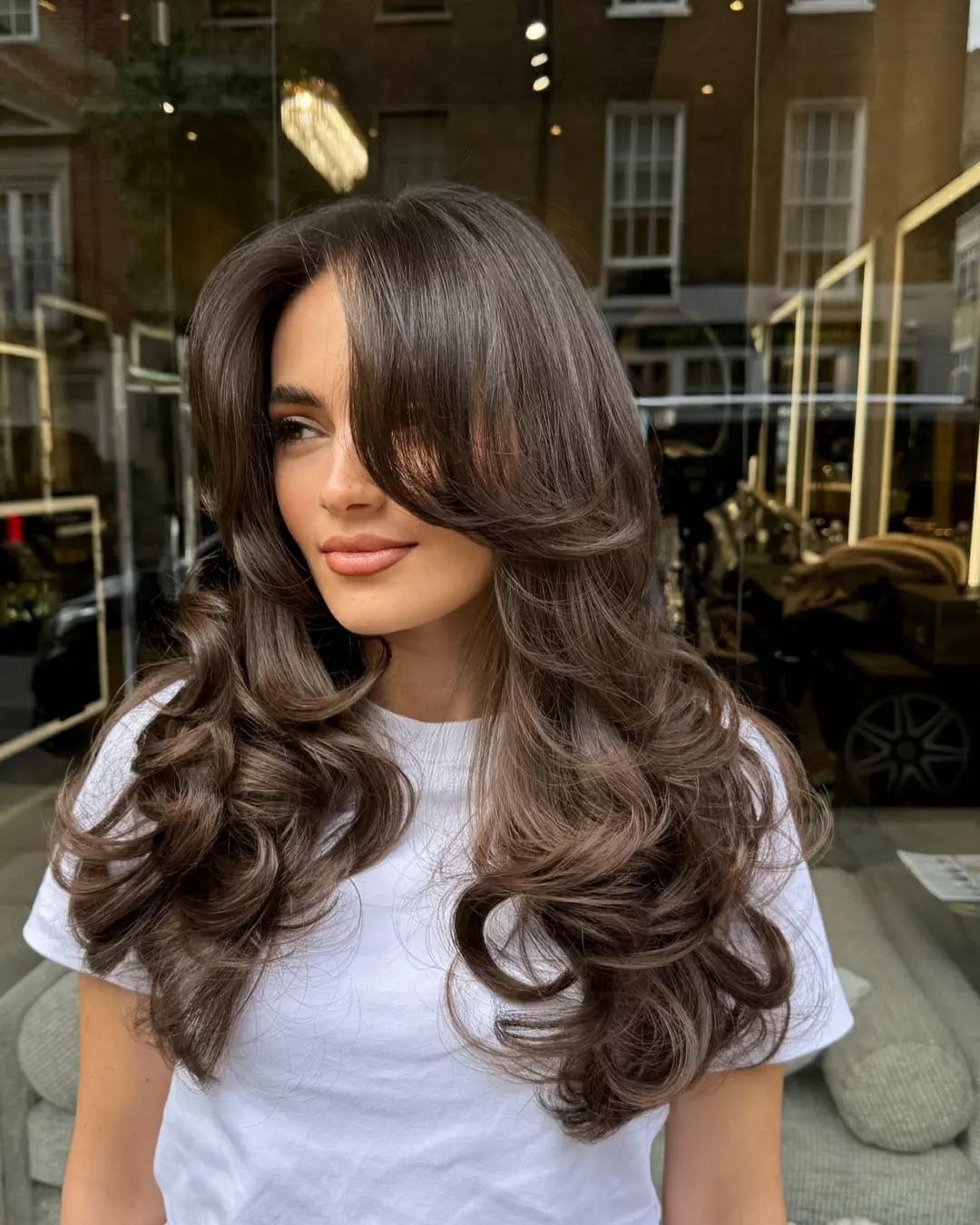 Voluminous Side-Swept Bangs With Luxe Waves