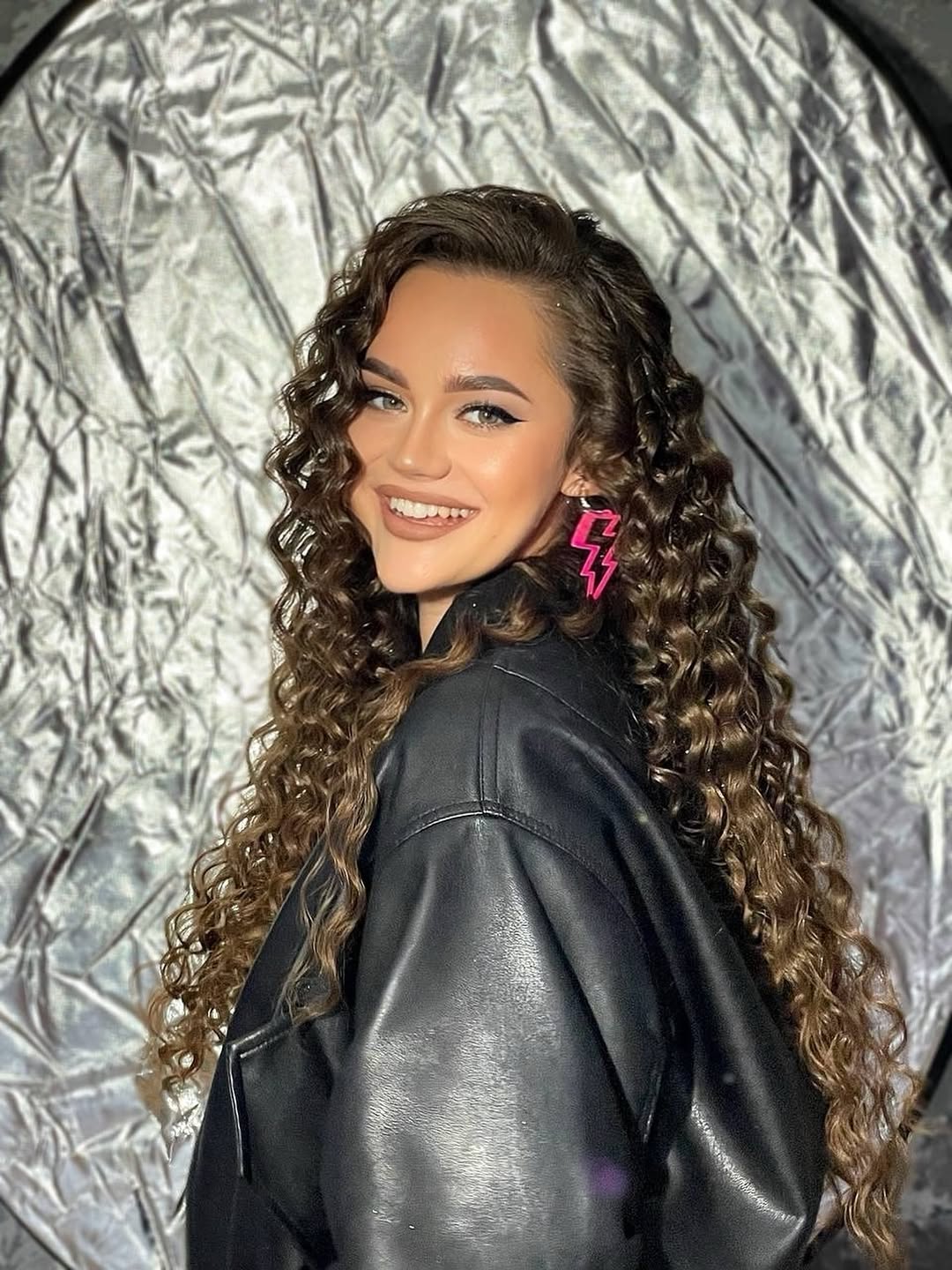 Voluminous Spiral Curls With Honey Bronde Highlights