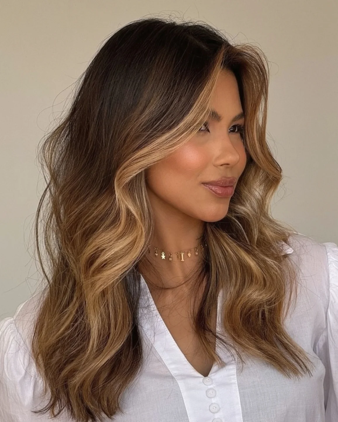 Wavy Brunette Layers With Caramel Money Piece